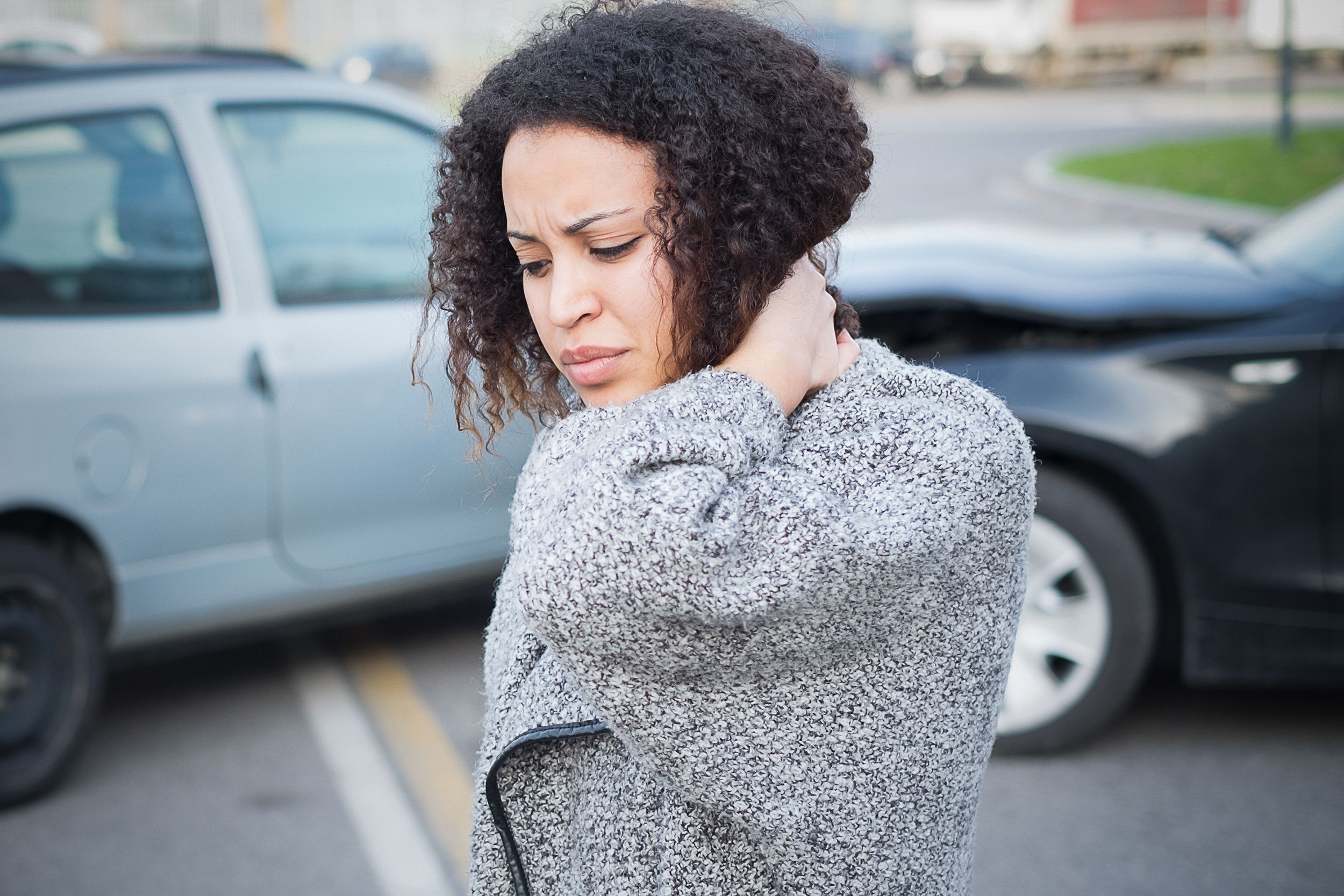 injured woman feeling bad after having car crash
