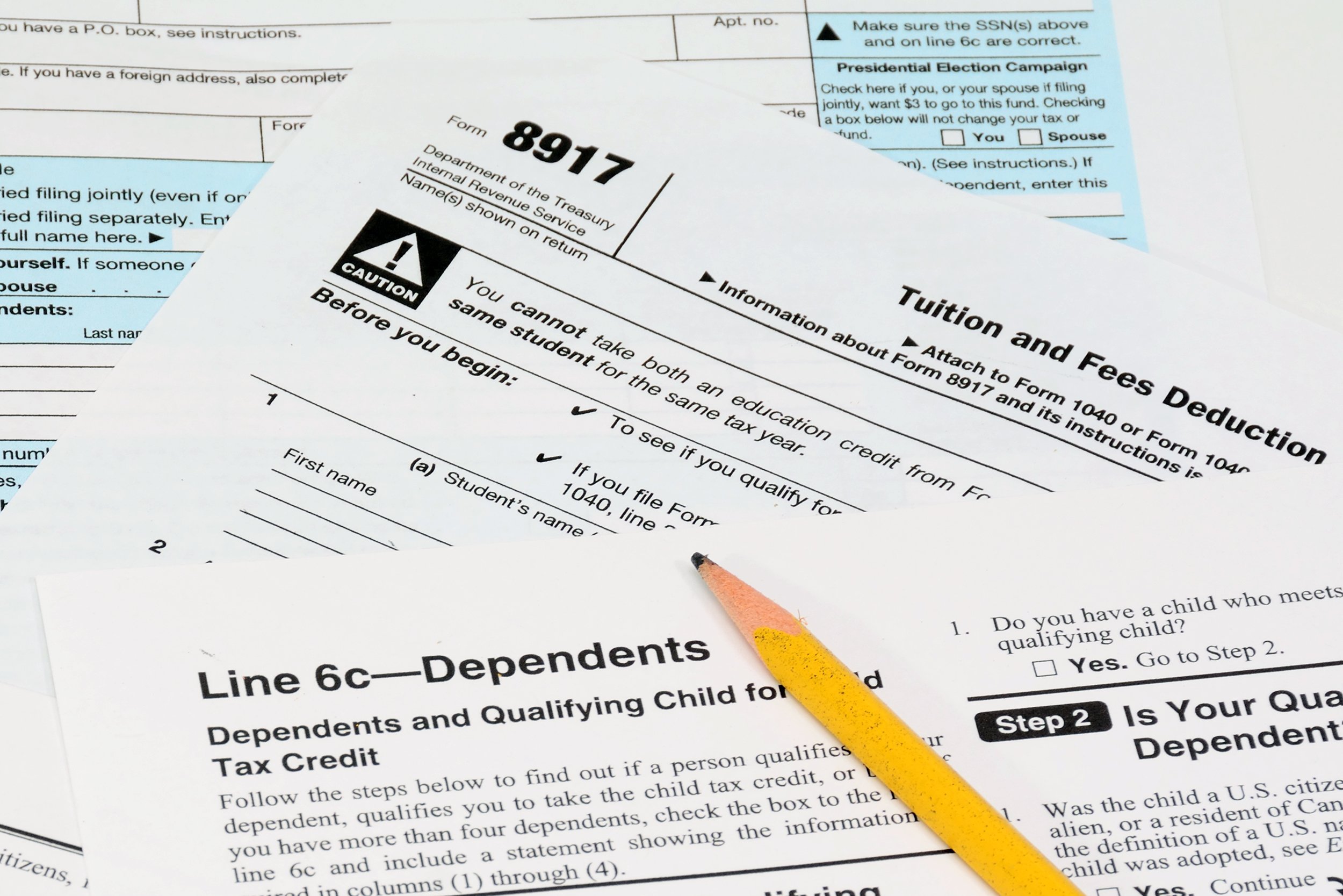 IRS tax forms 1040 and 8917 worksheet