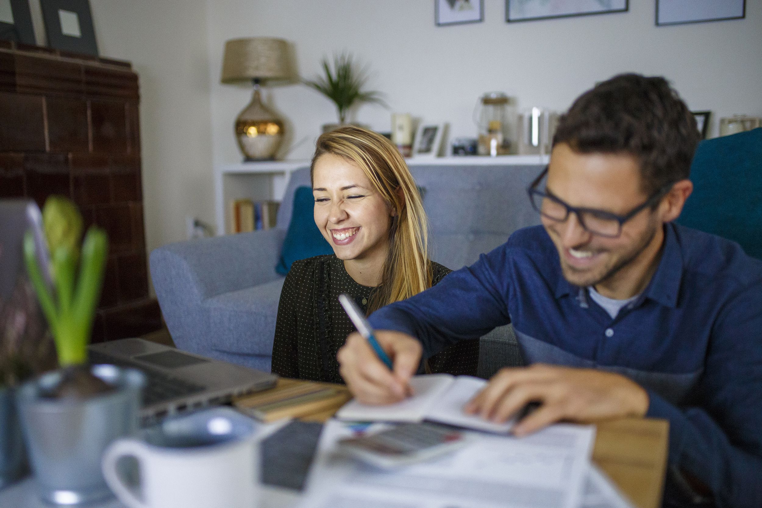 couple sorting out finances at home