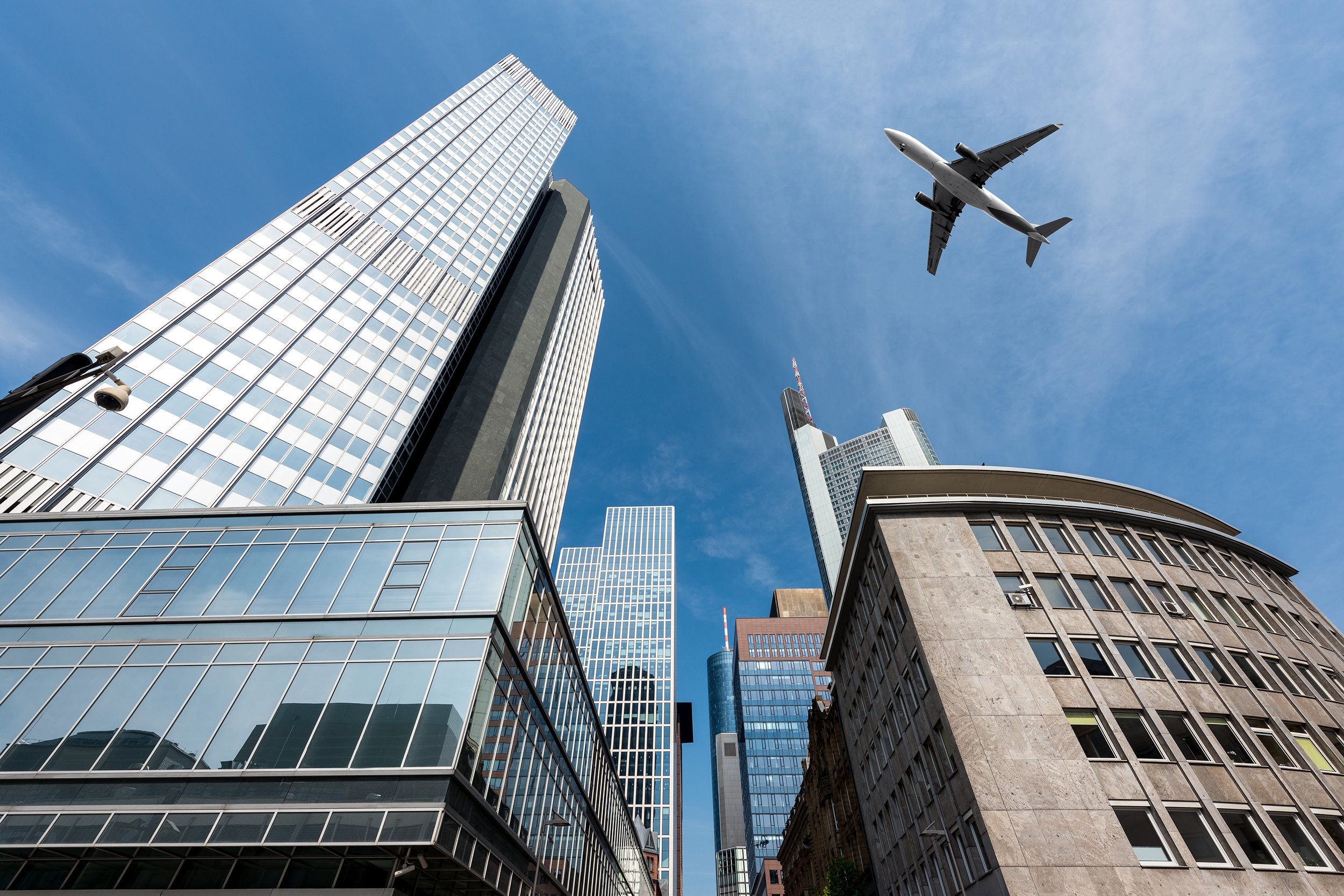 Airplane flying over a city