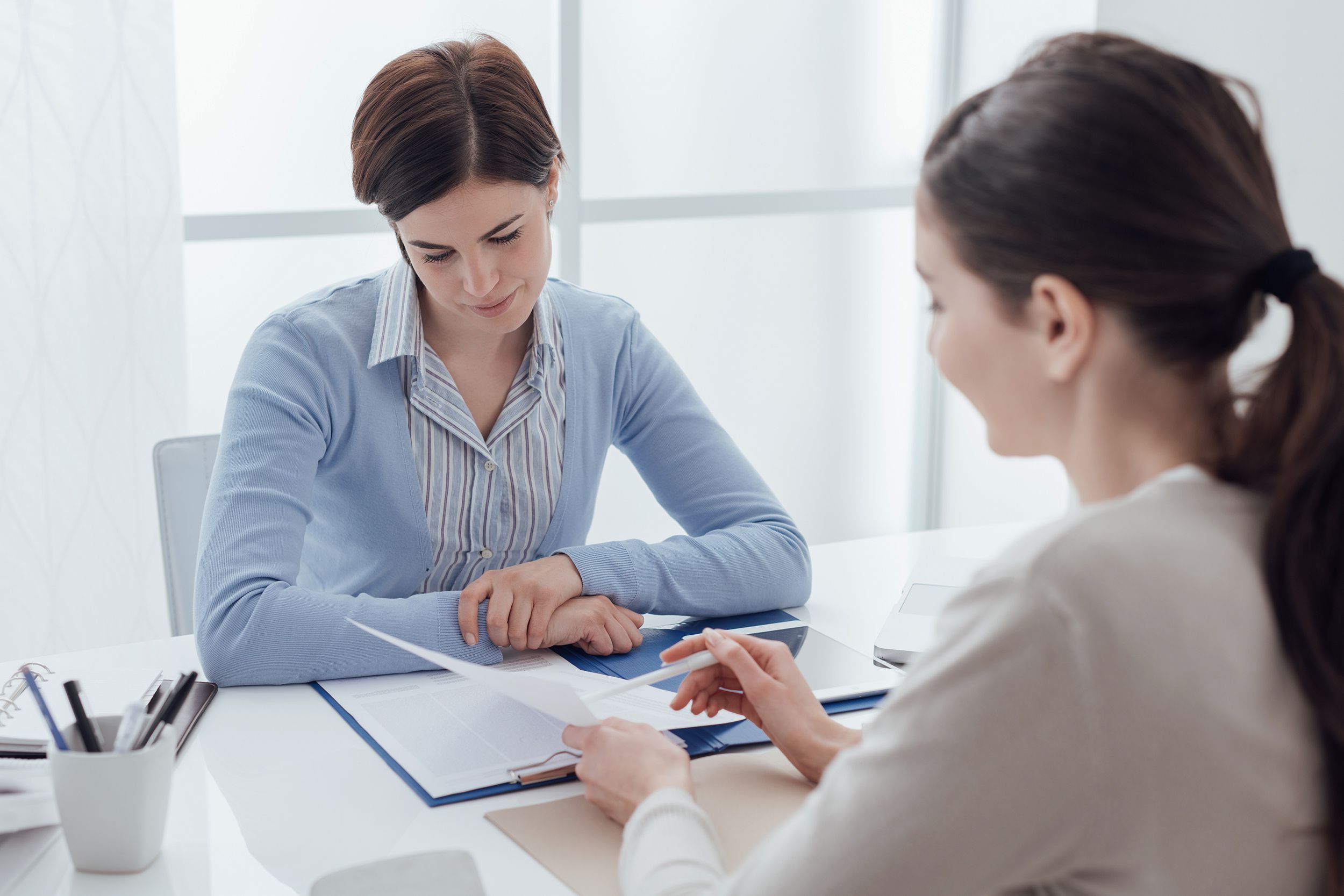 employee meeting with hr in office
