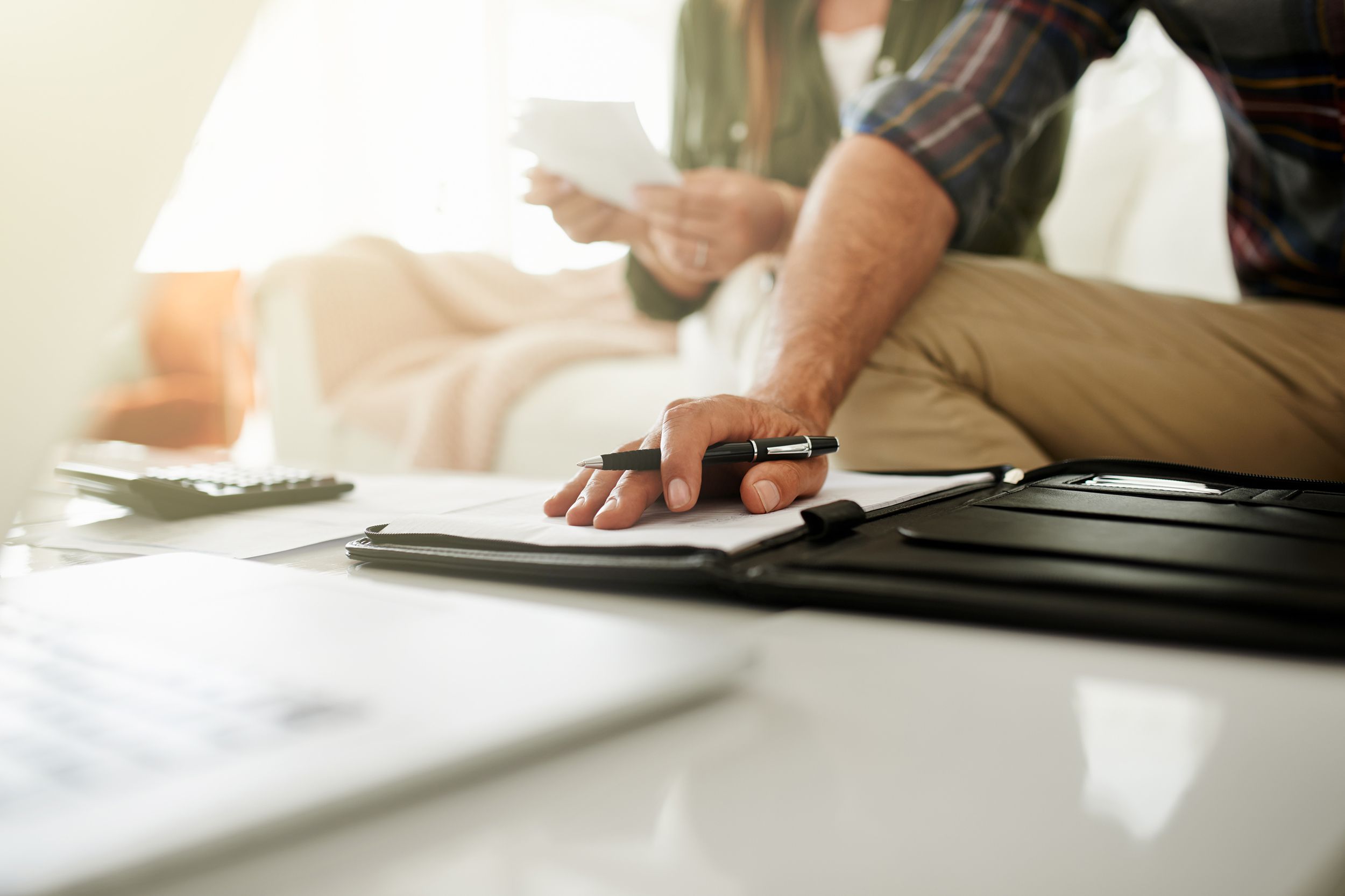 couple at home doing finances
