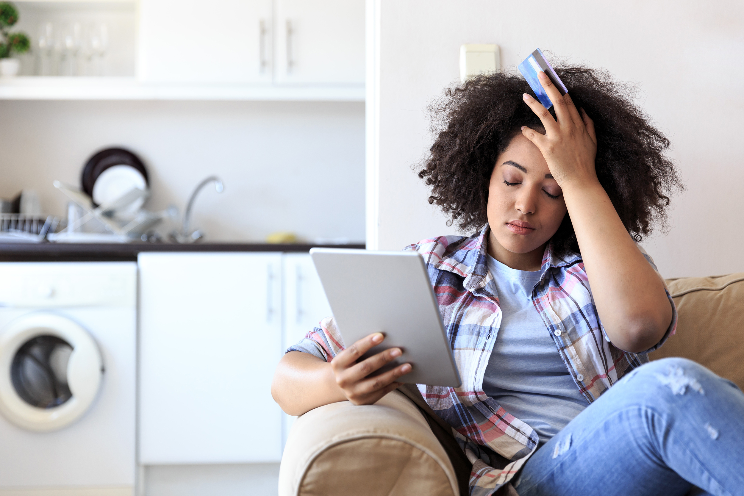 Stressed out woman dealing with her debt