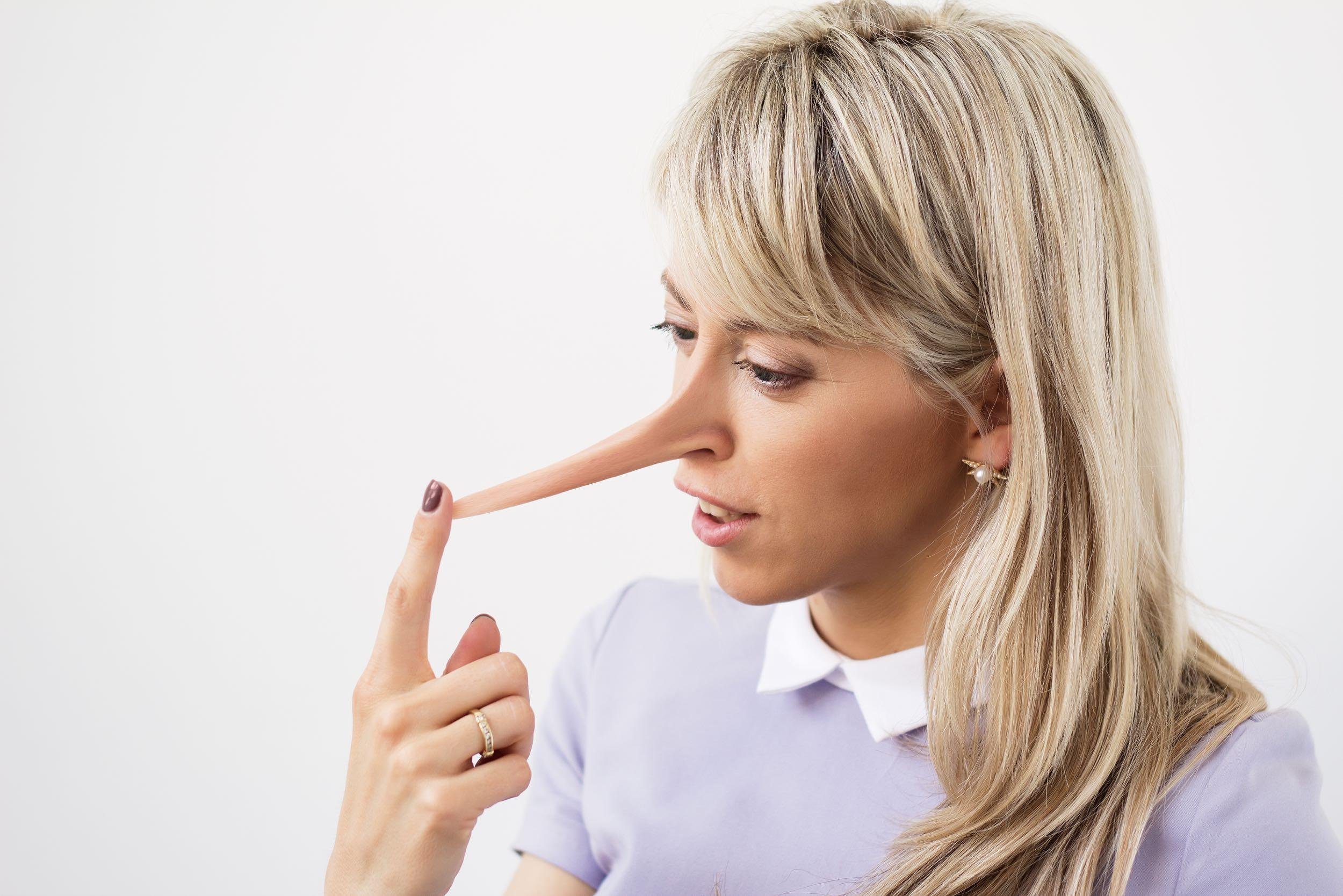woman with liar nose