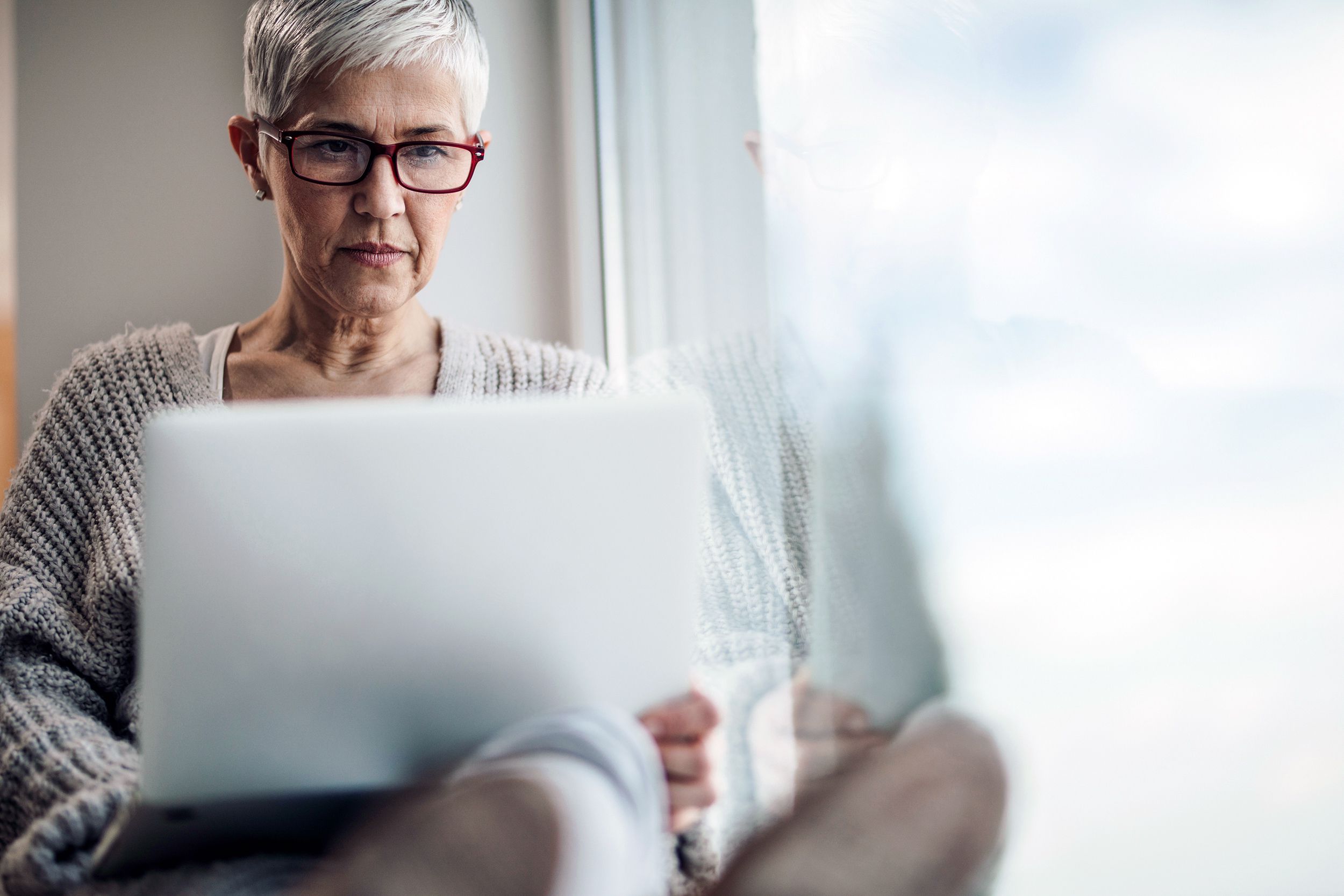 Senior woman on her laptop