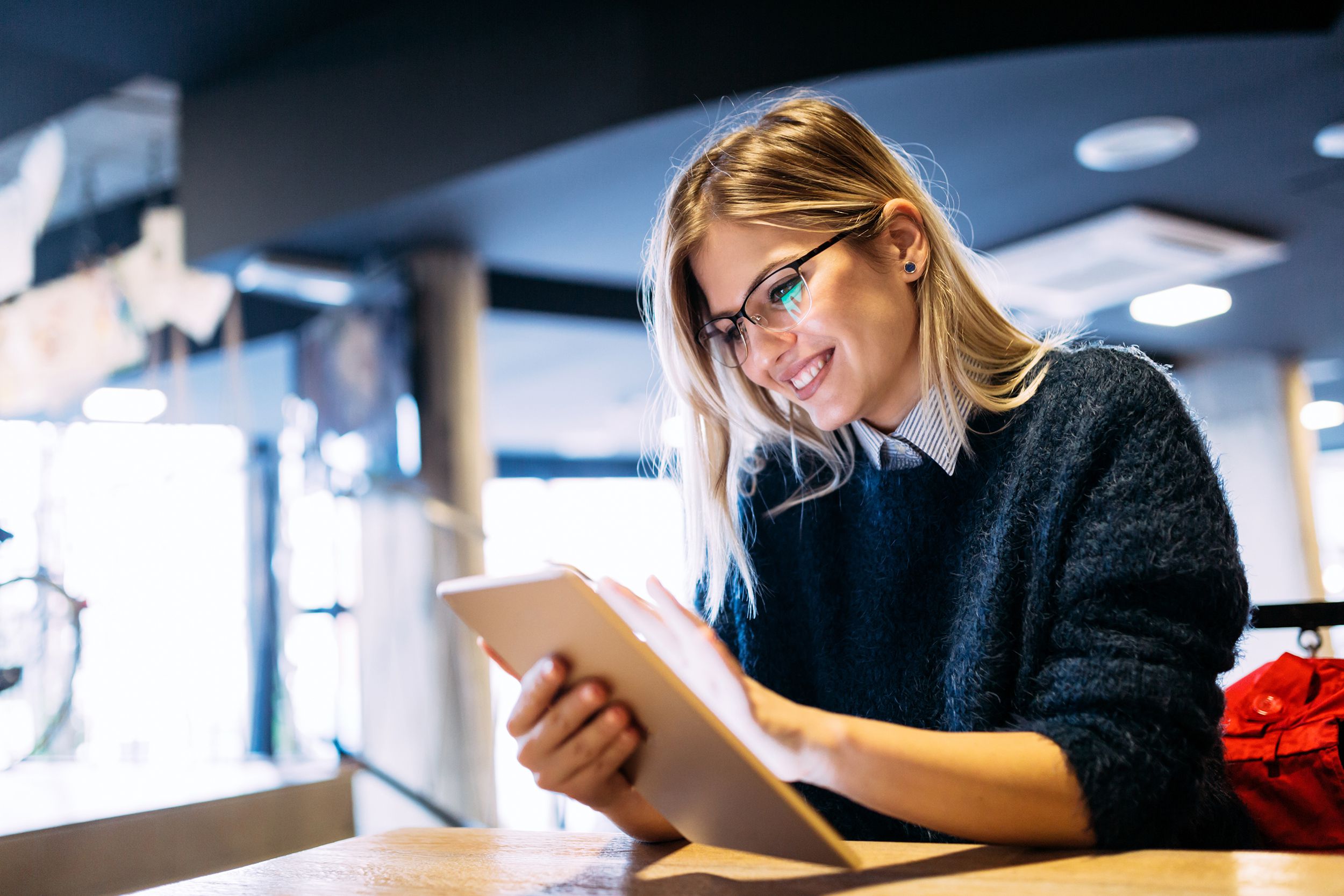 woman using tablet at work