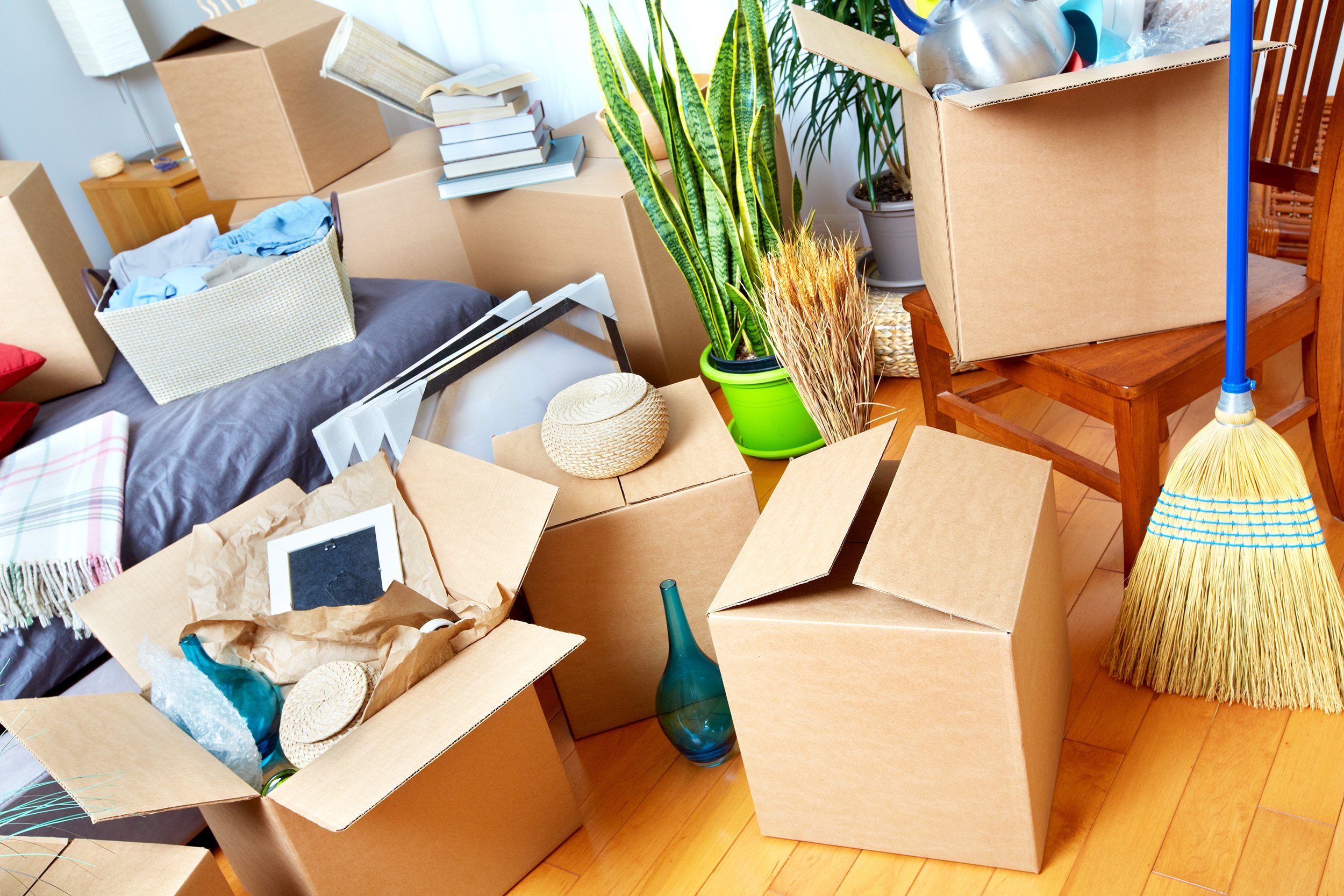 moving boxes and clutter in room