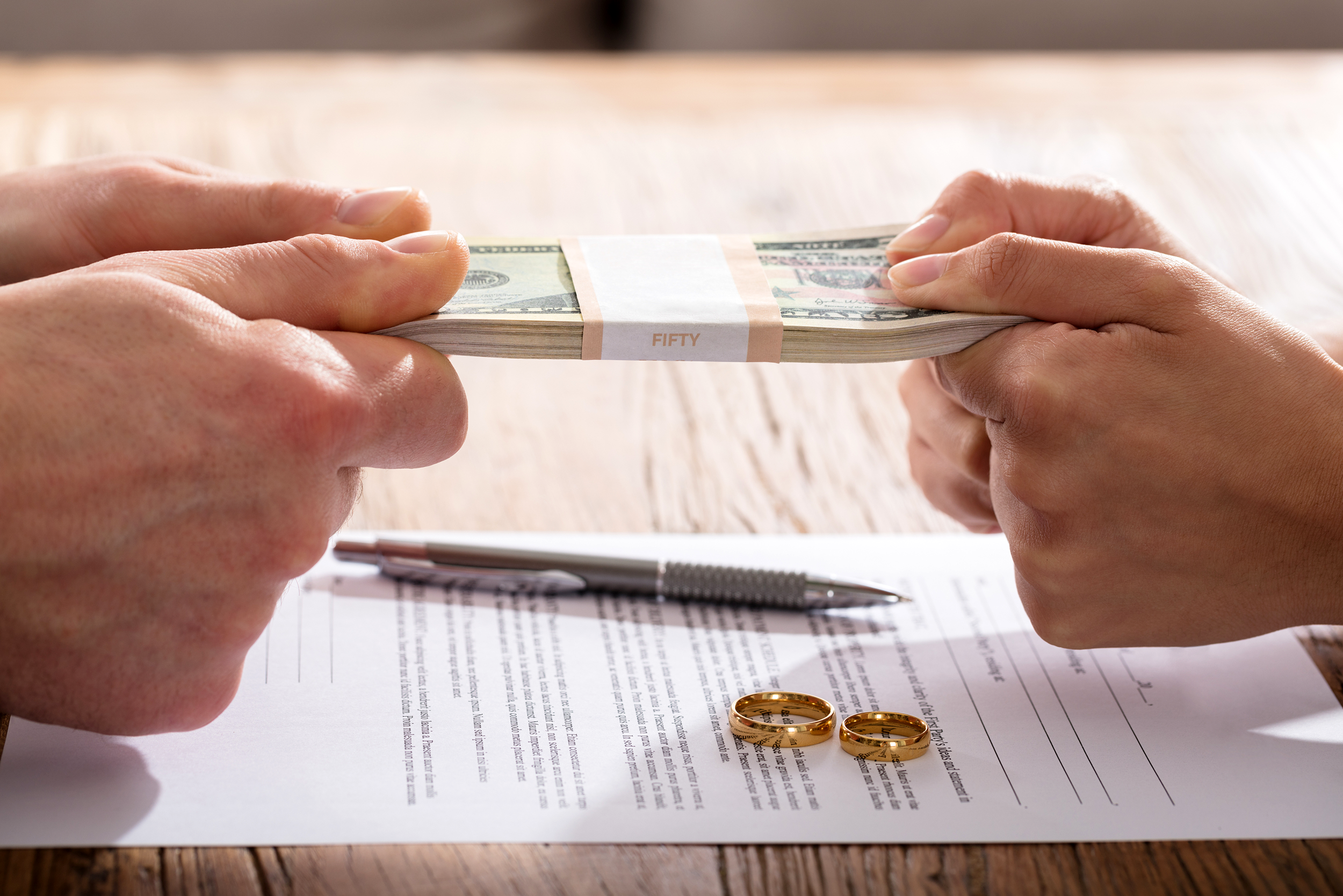 Divorcing couple fighting over money