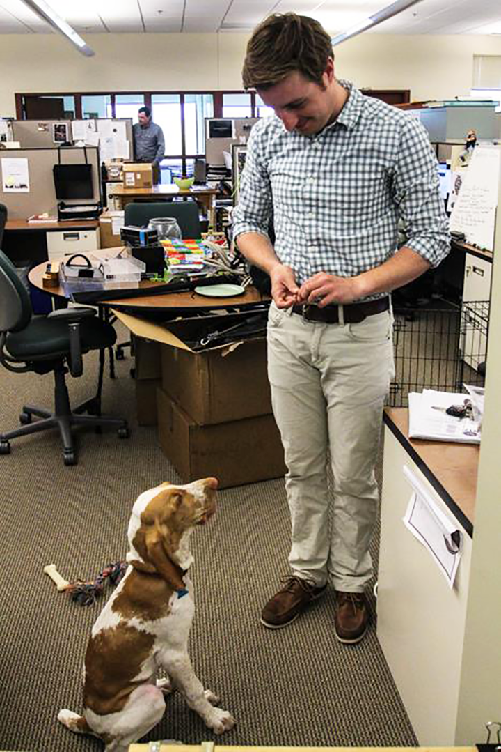 Employee and dog at an Orvis office