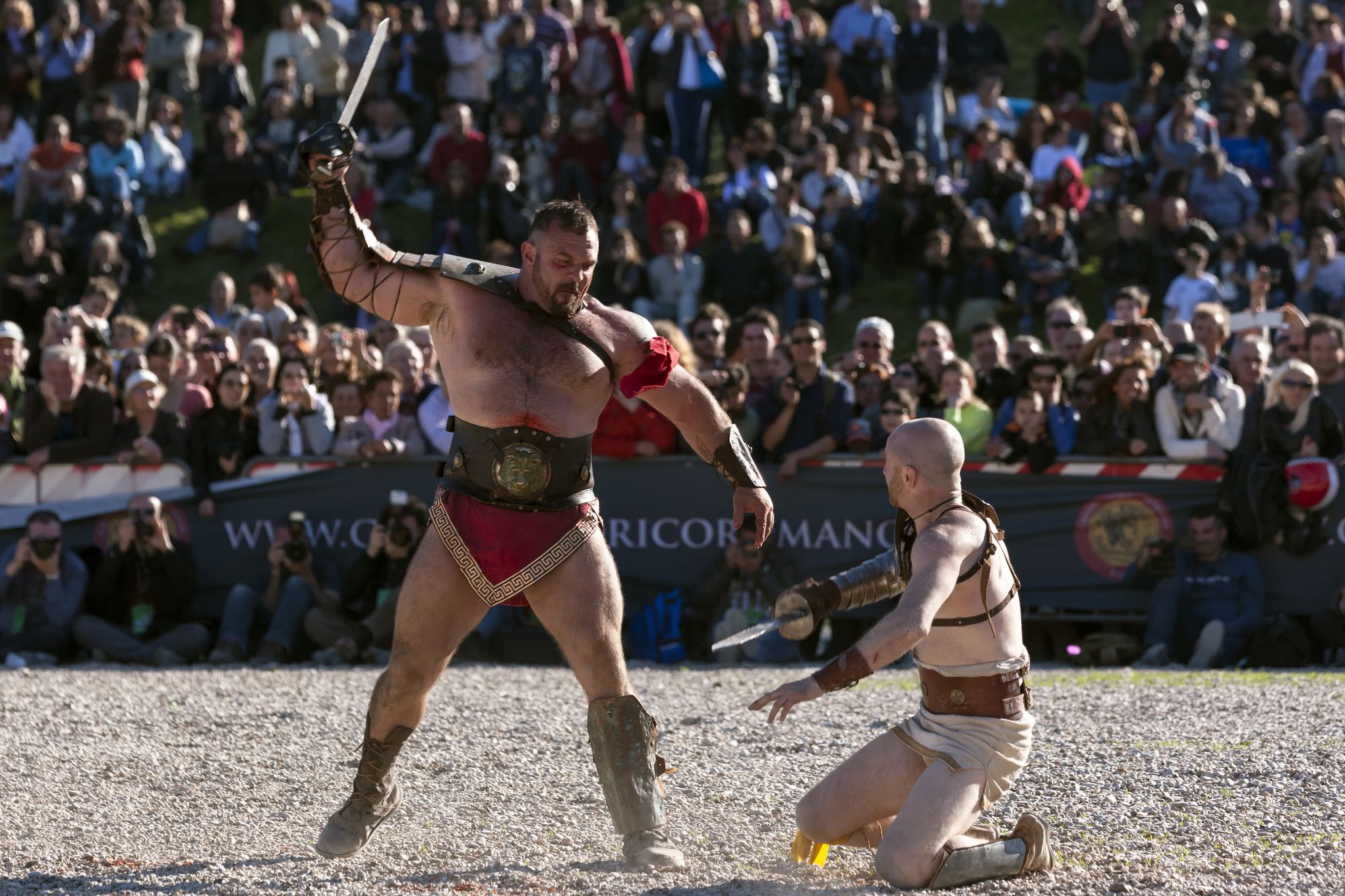 gladiators in costume fighting in rome