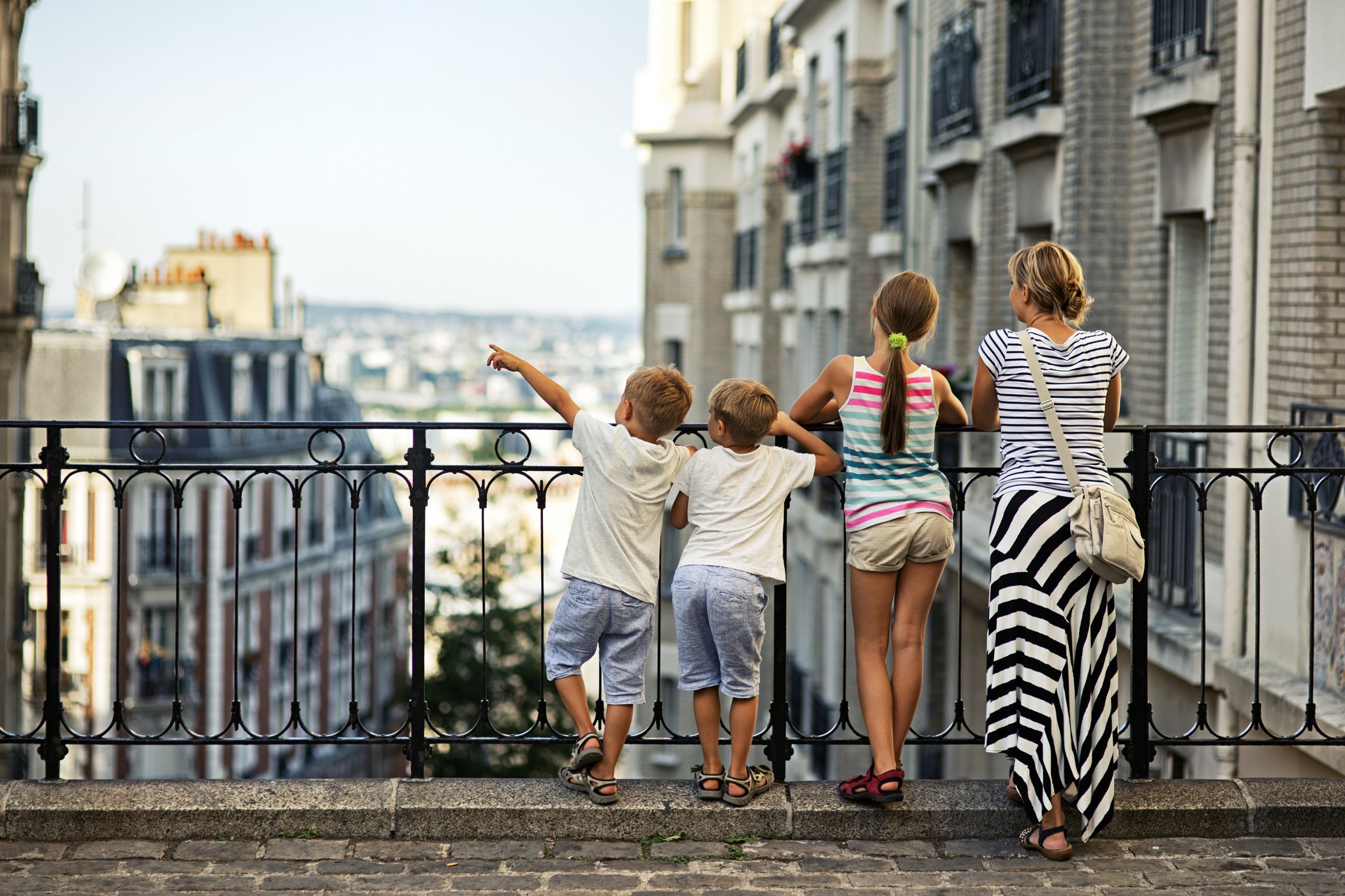 mother and three kids in montmarte, paris