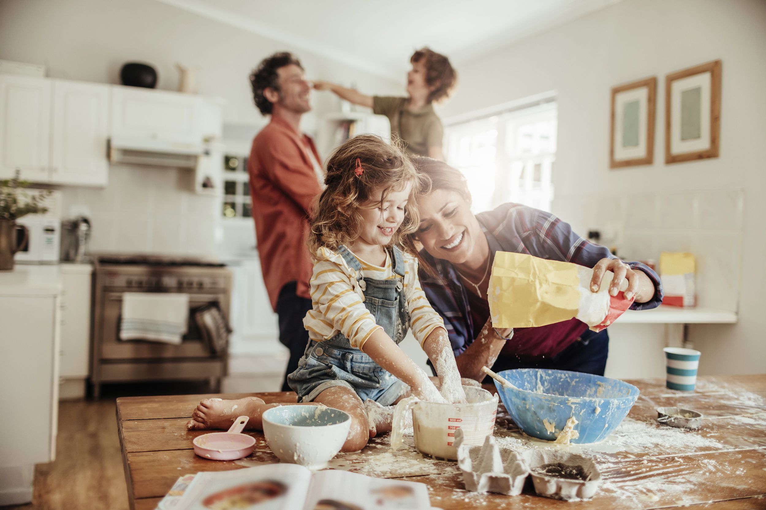 young family baking together