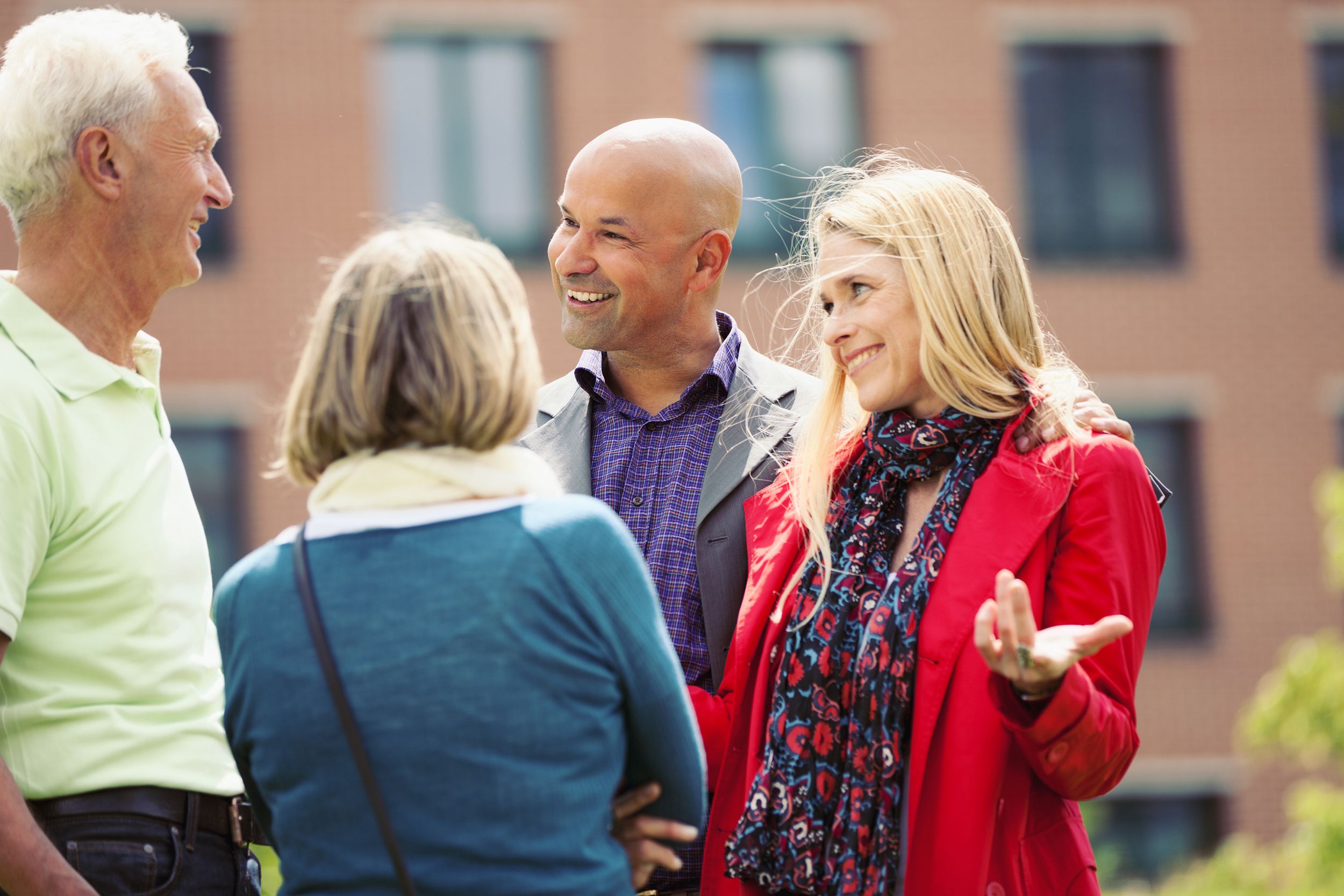 adult woman introducing her boyfriend to parents