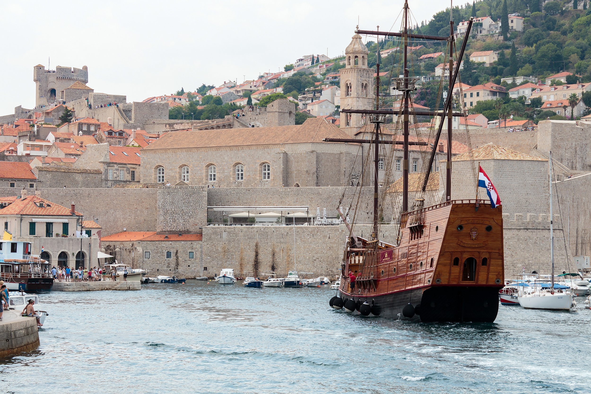 HBO television show Game of Thrones tourist sailing ship entering a harbor of Dubrovnik, Croatia