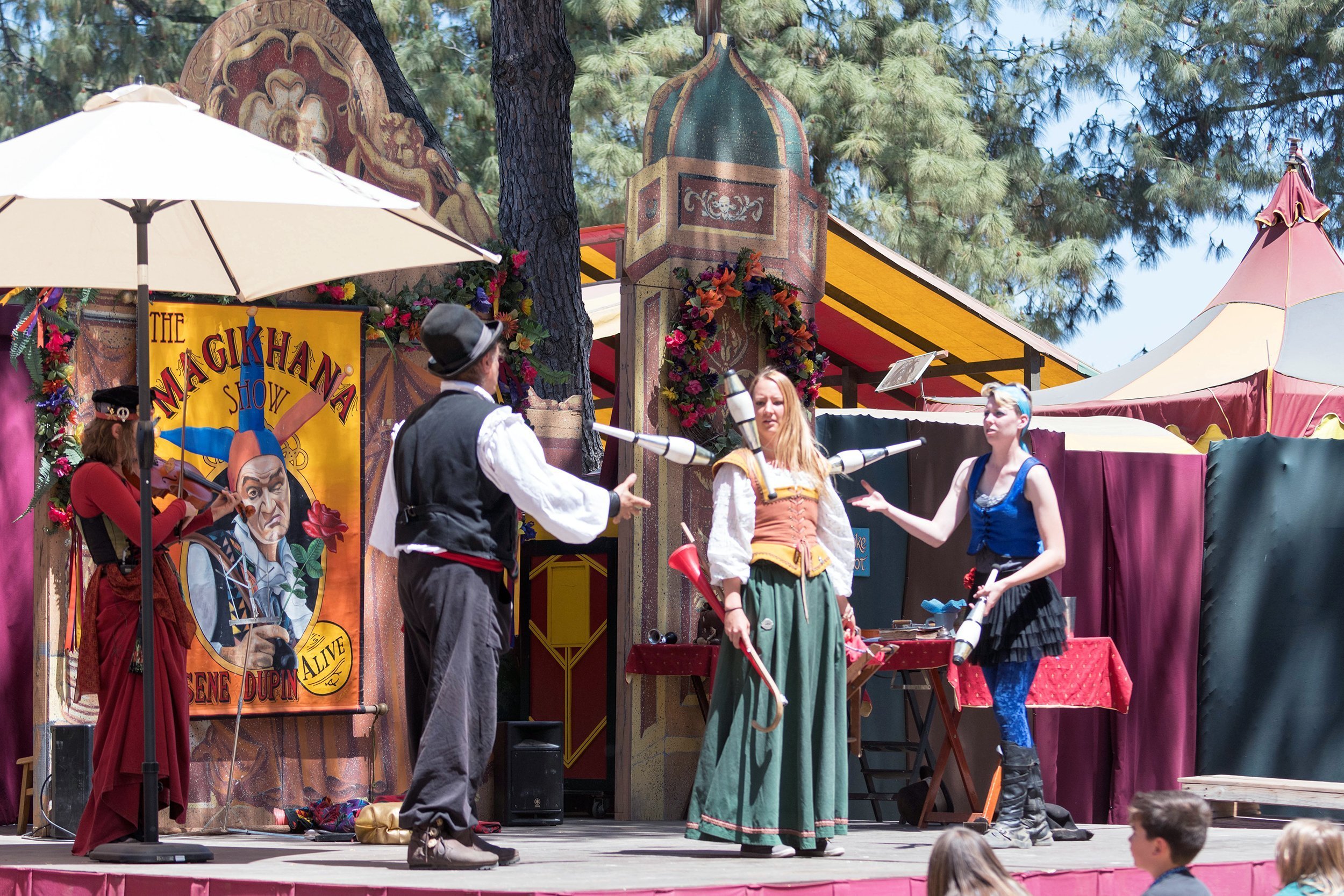 magician juggler performing during a renaissance fair