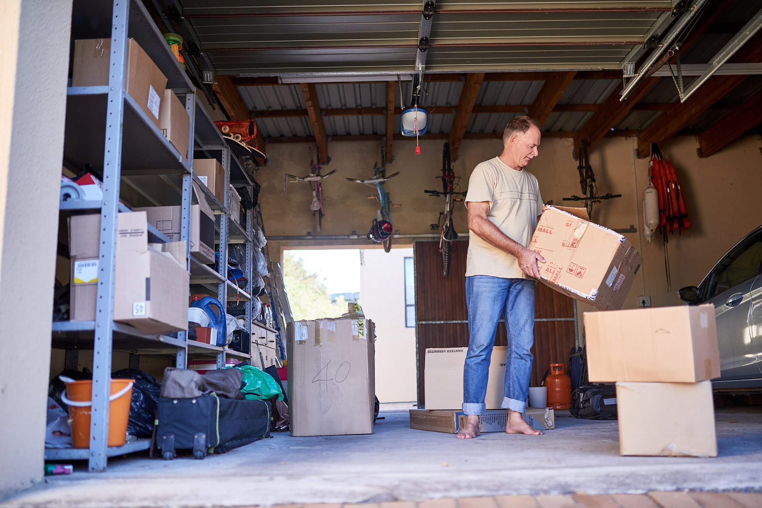 Man cleaning garage