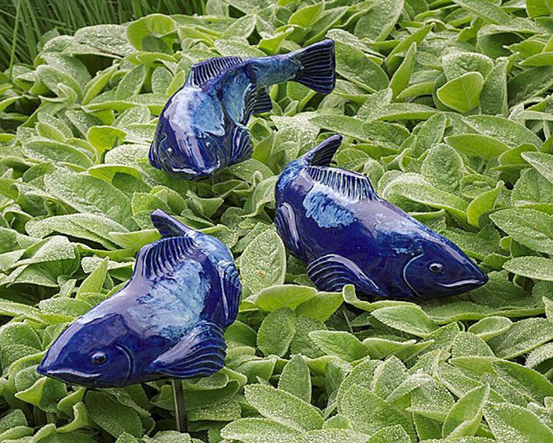 swimming koi sculptures