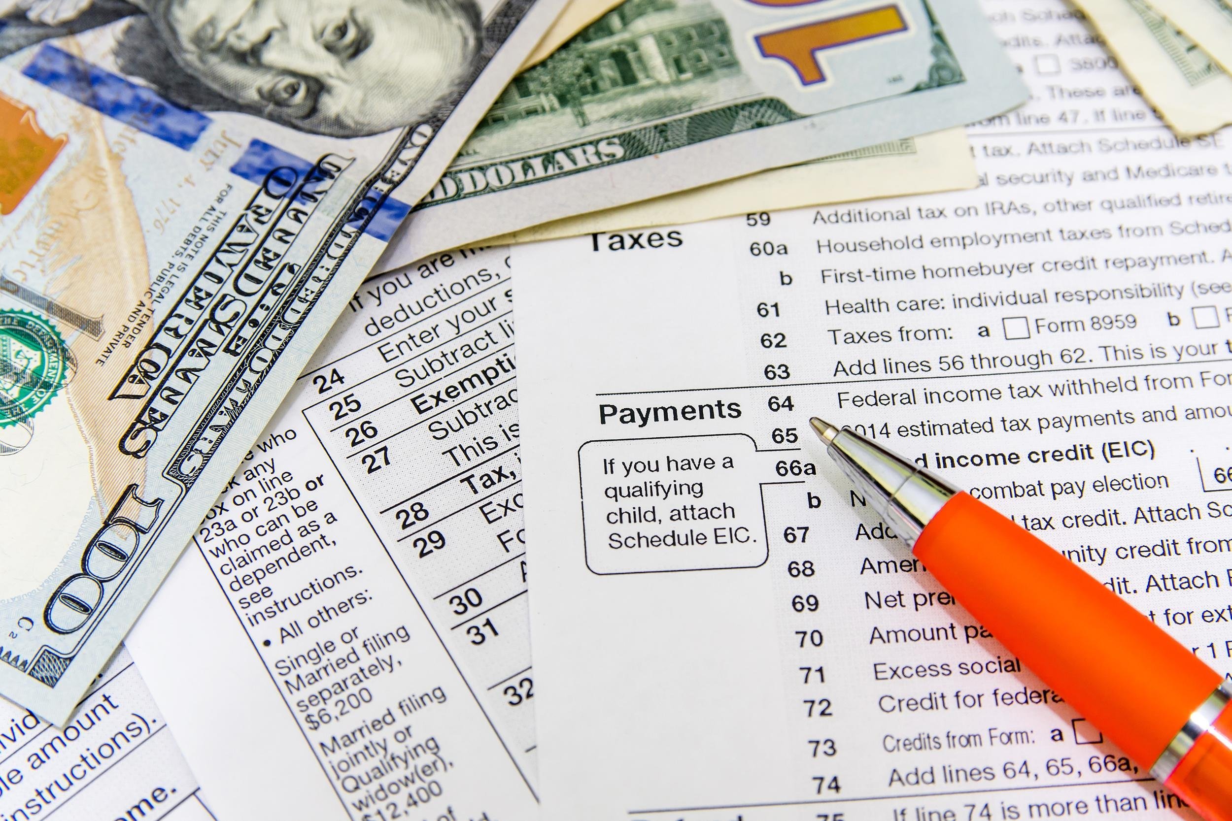 tax form individual tax return with pen