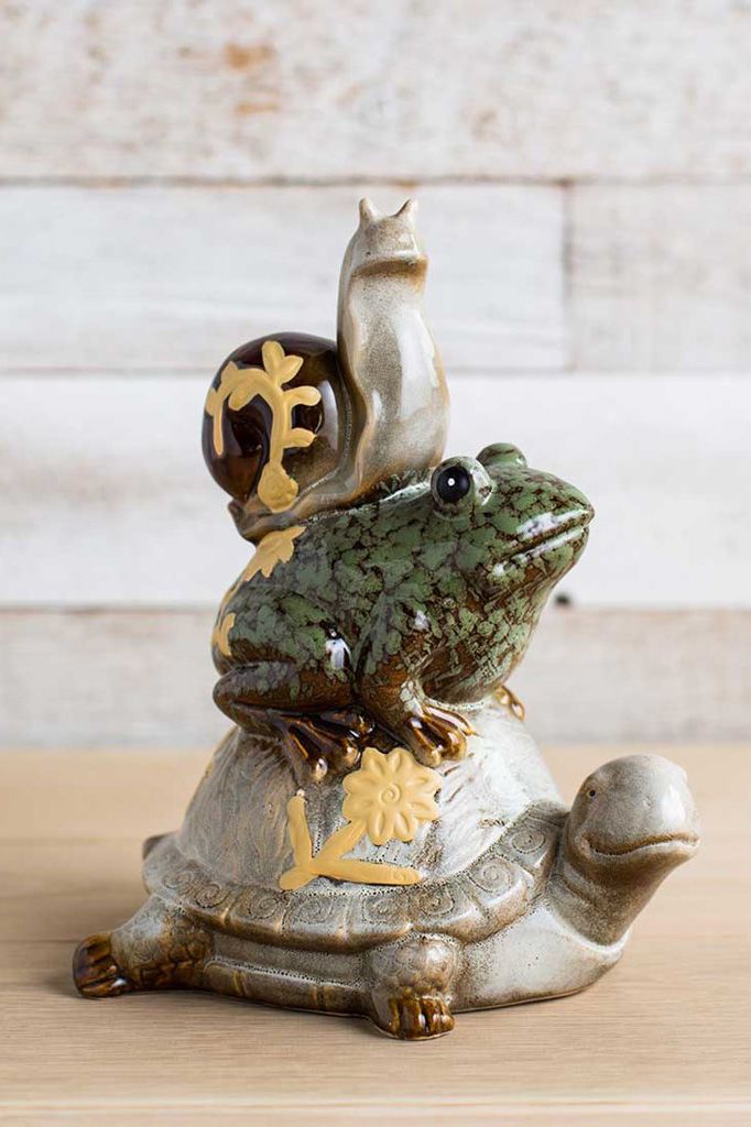 ceramic tortoise, frog and snail statue