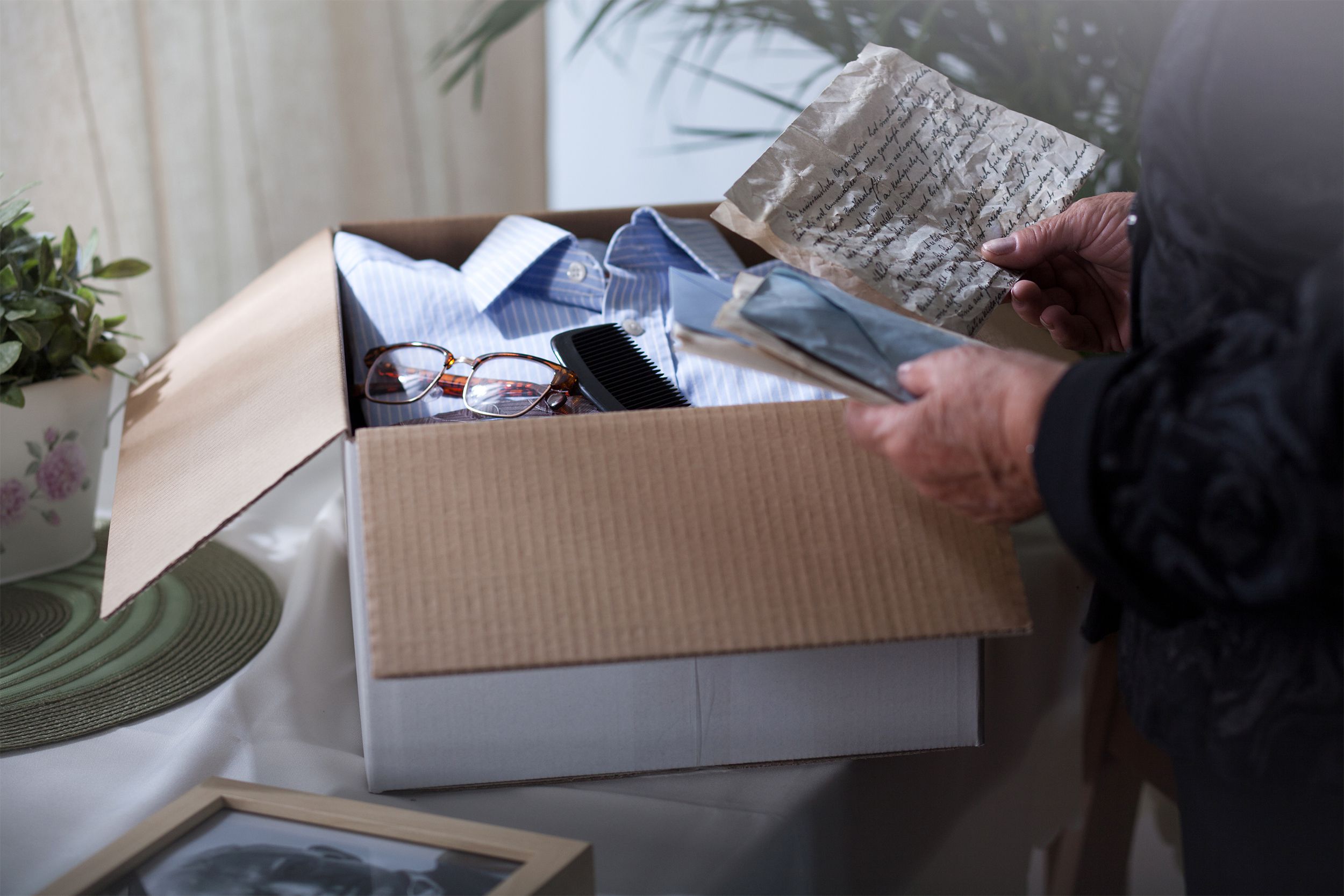 Woman going through mementos