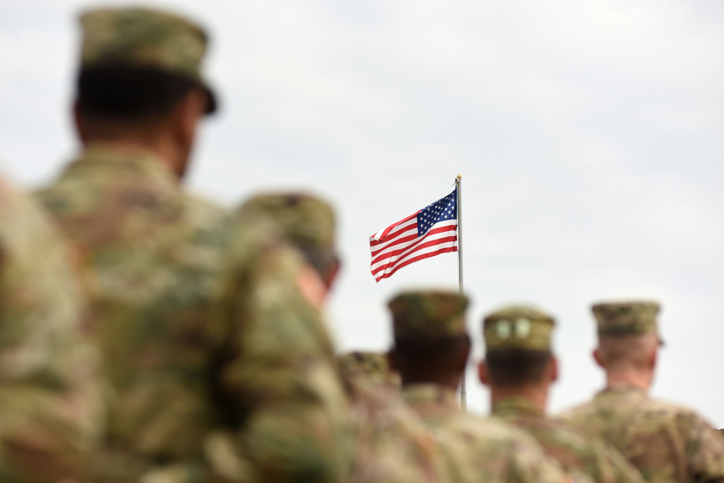 American soldiers and US flags
