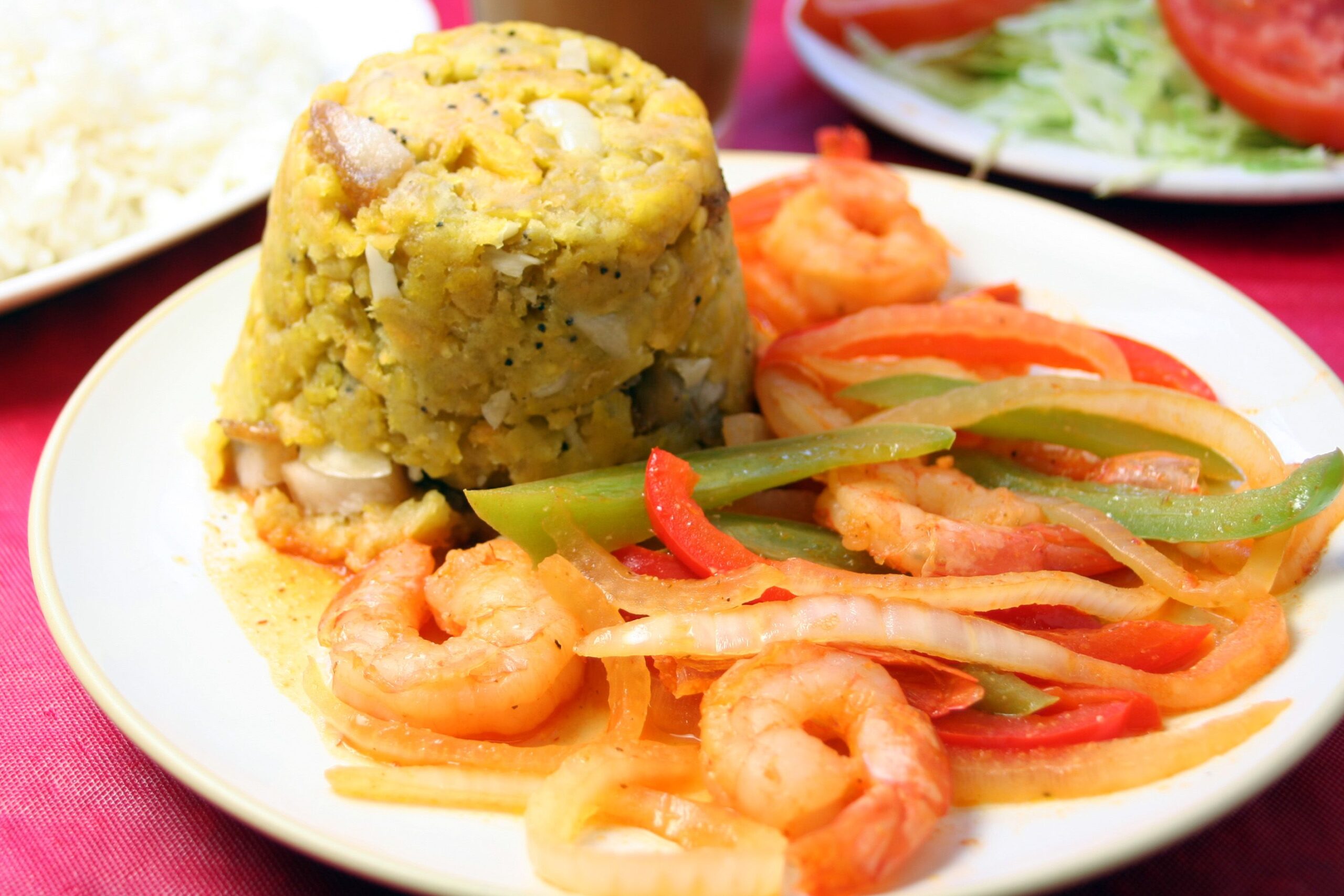 mofongo, shrimp and peppers on plate