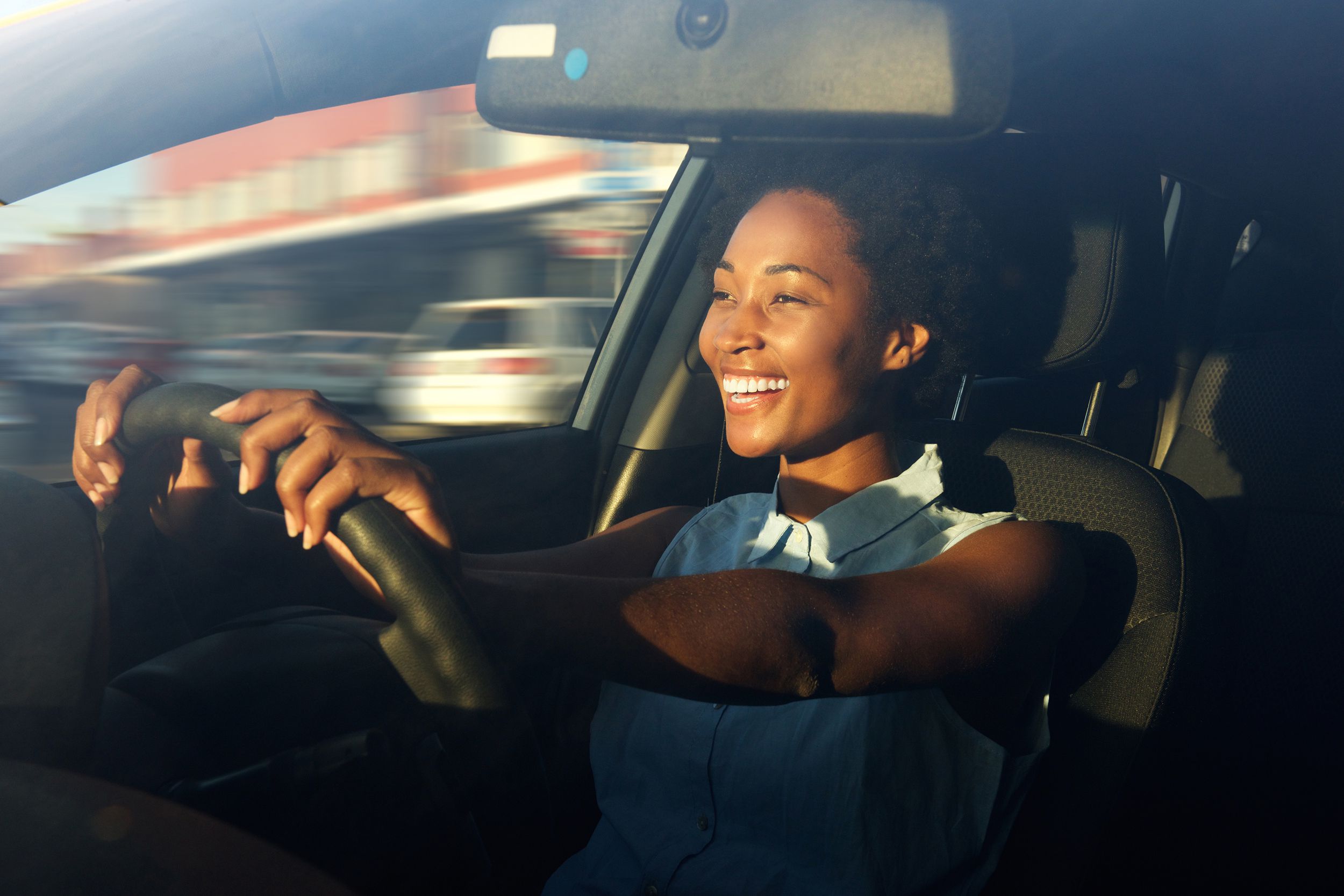 young woman driving a car