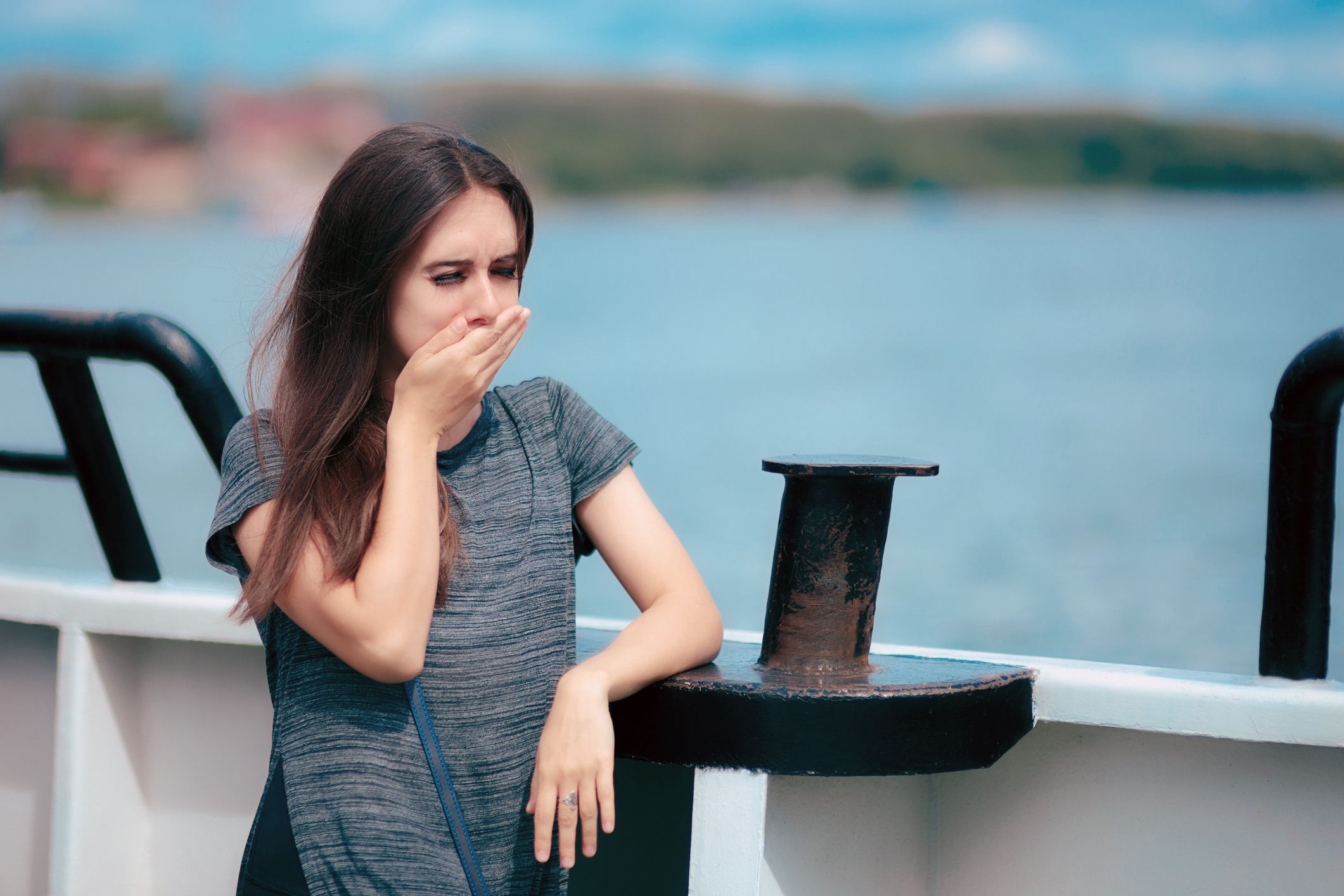 seasick woman on deck