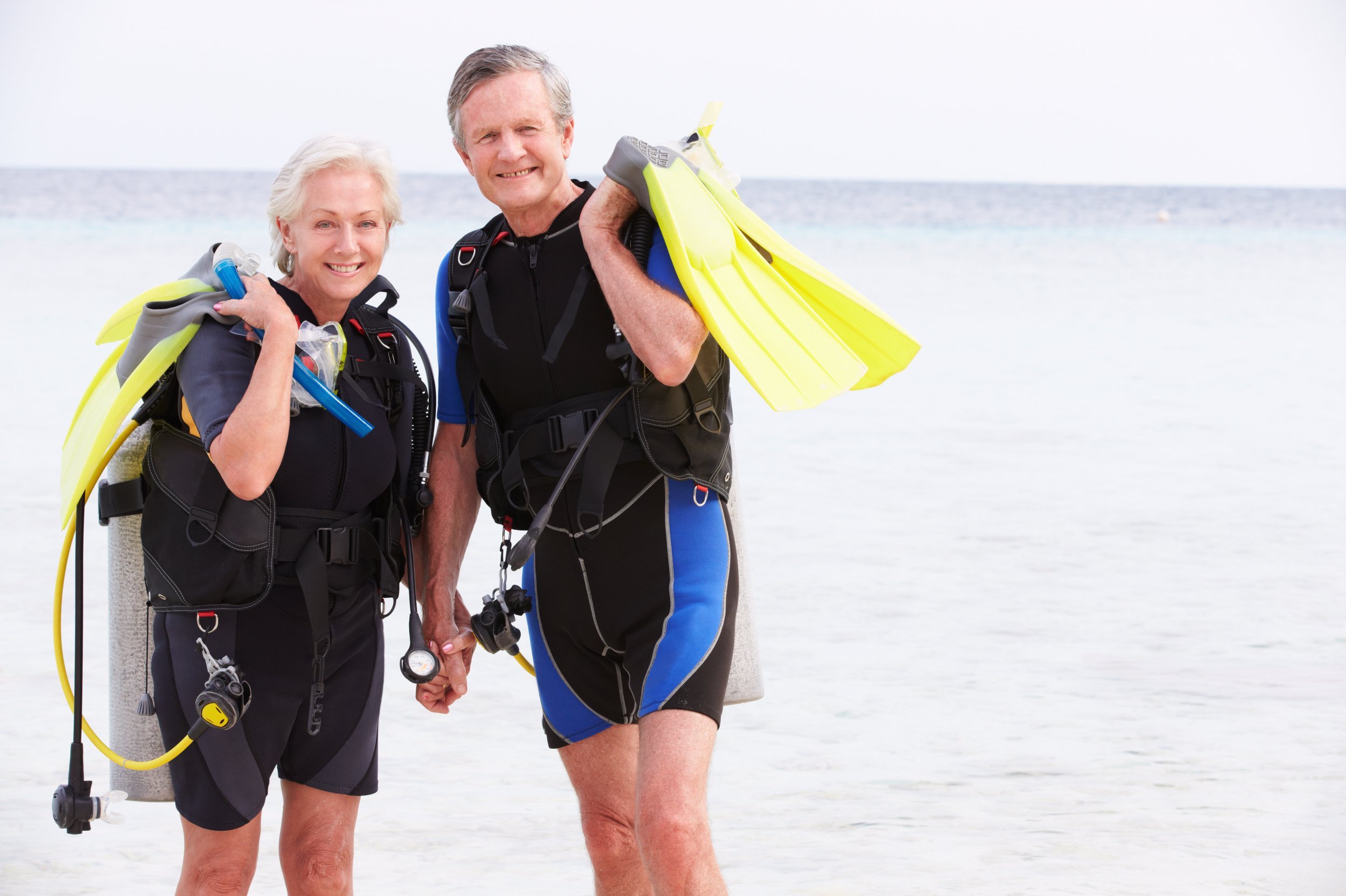 Senior couple With scuba diving equipment.