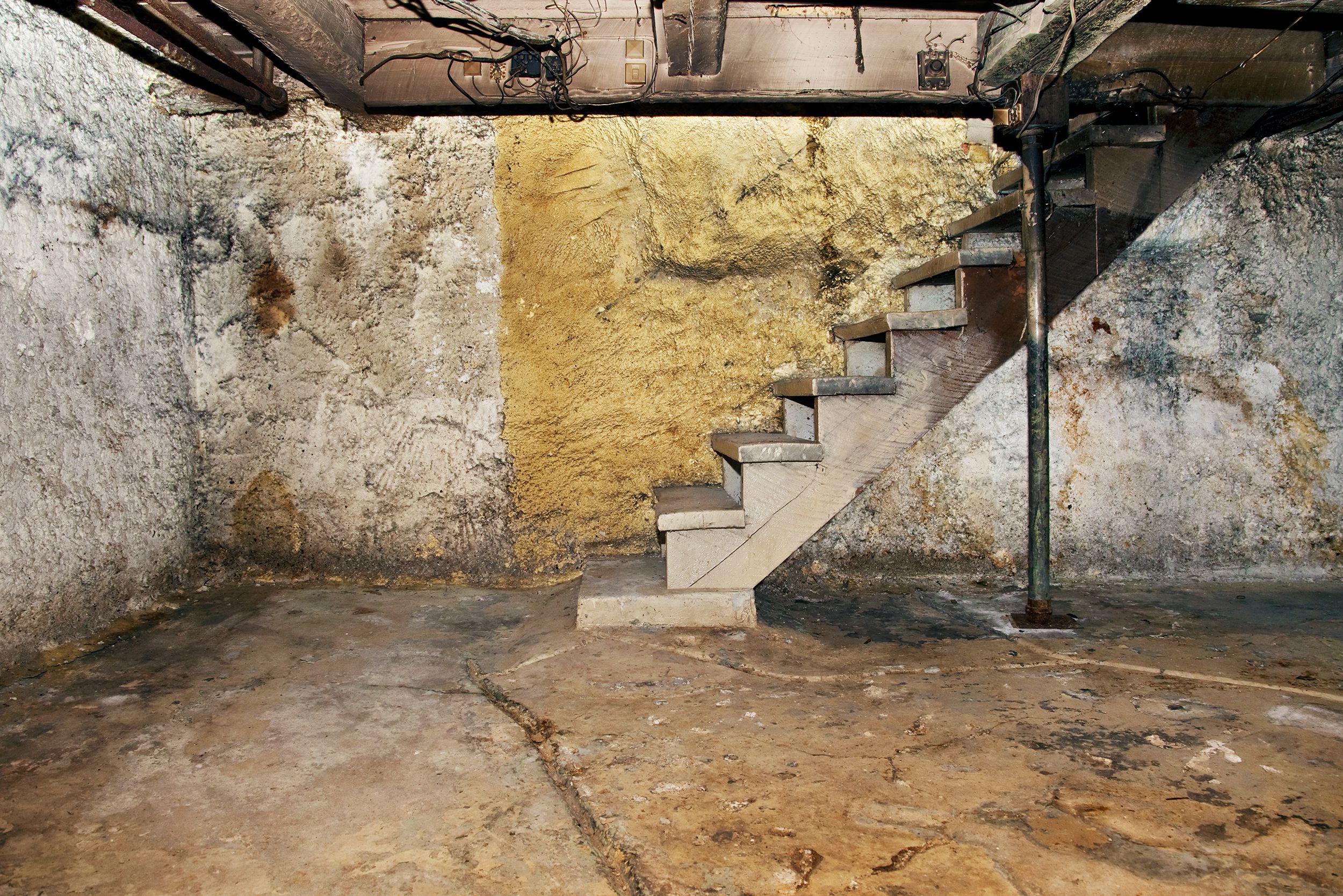 stairs to decrepit basement