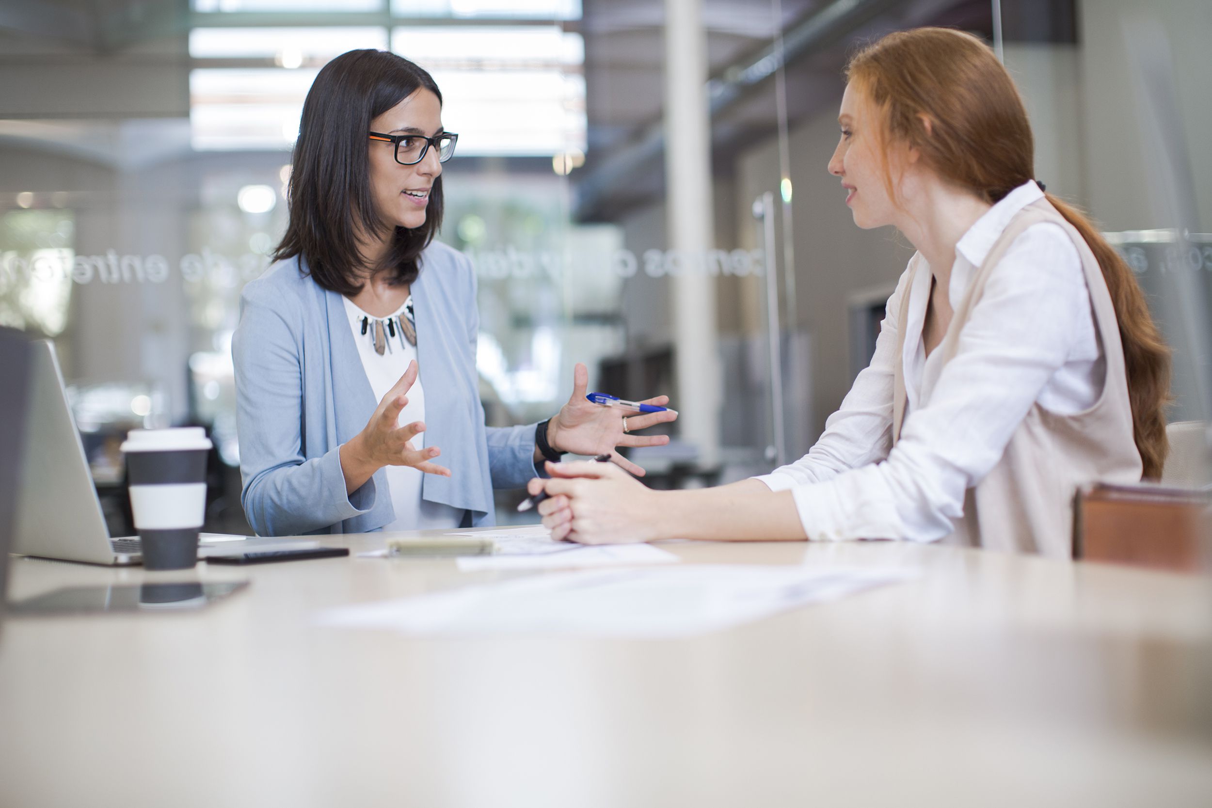 two business woman working together