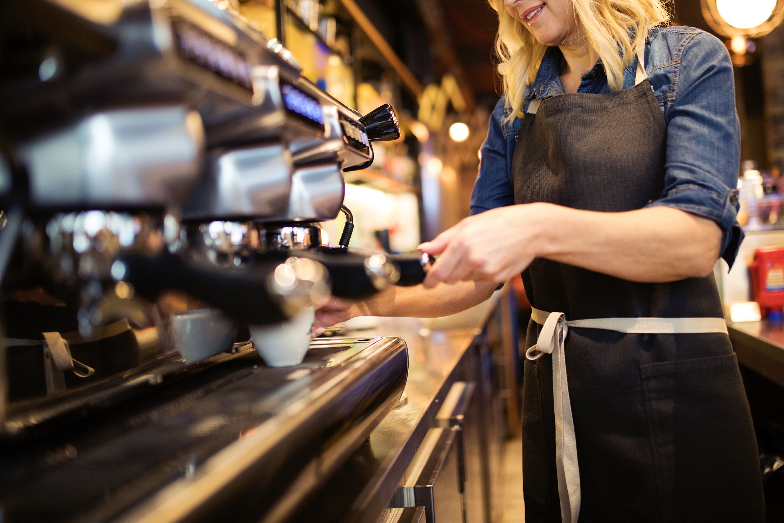 Barista making coffee
