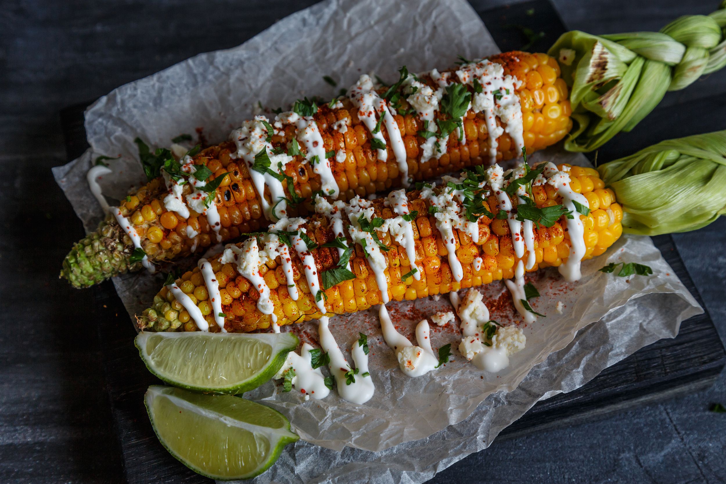 elote or mexican grilled corn on the cob served with