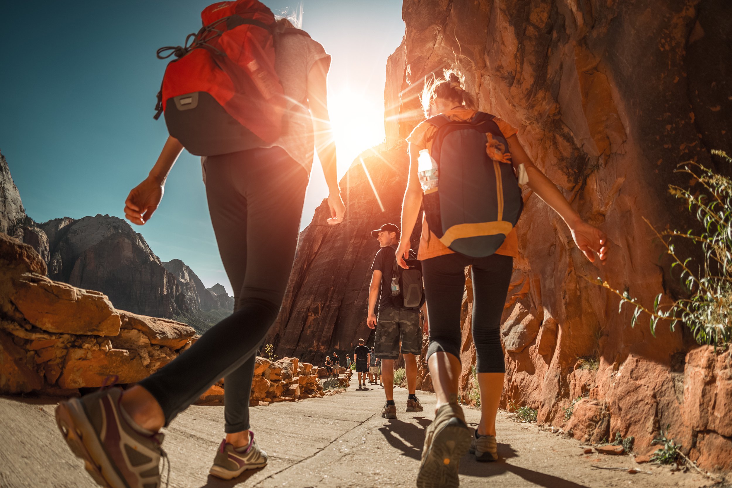 hiker with backpacks in Zion National Park