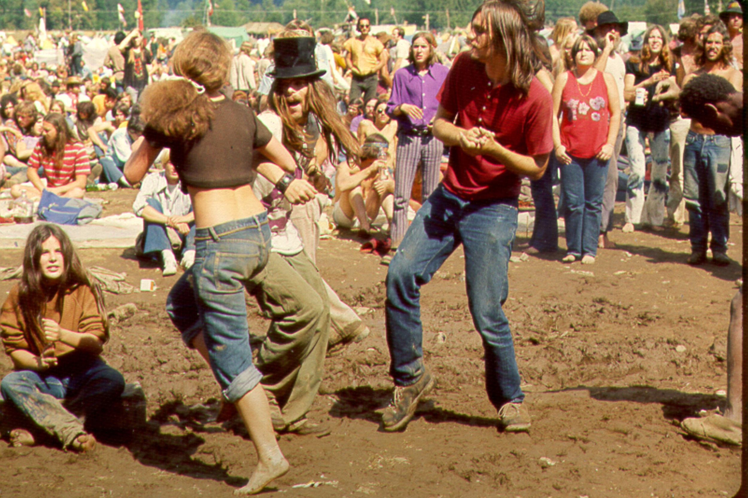 hippies dancing in a gathering