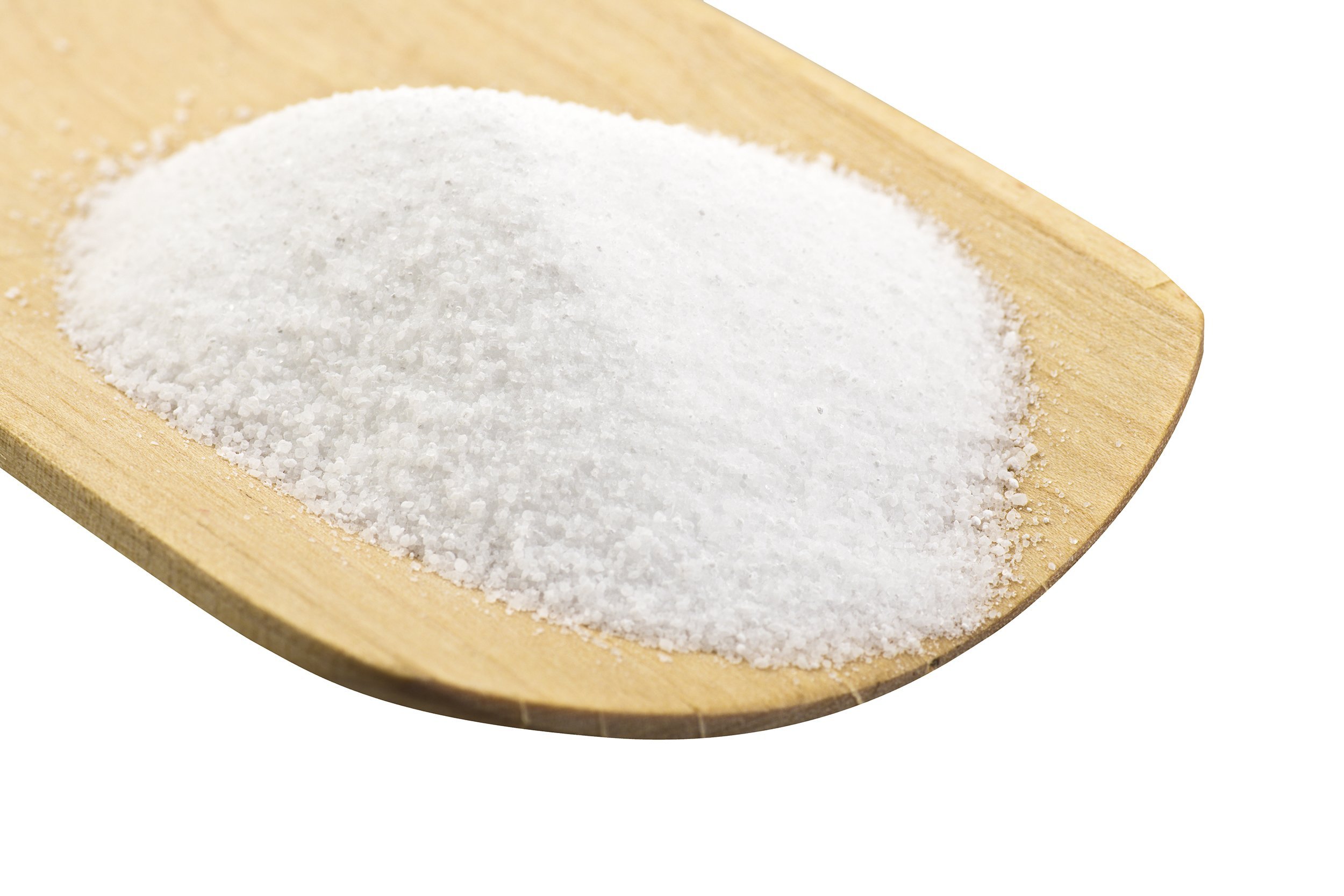 fine salt on the spoon of wood