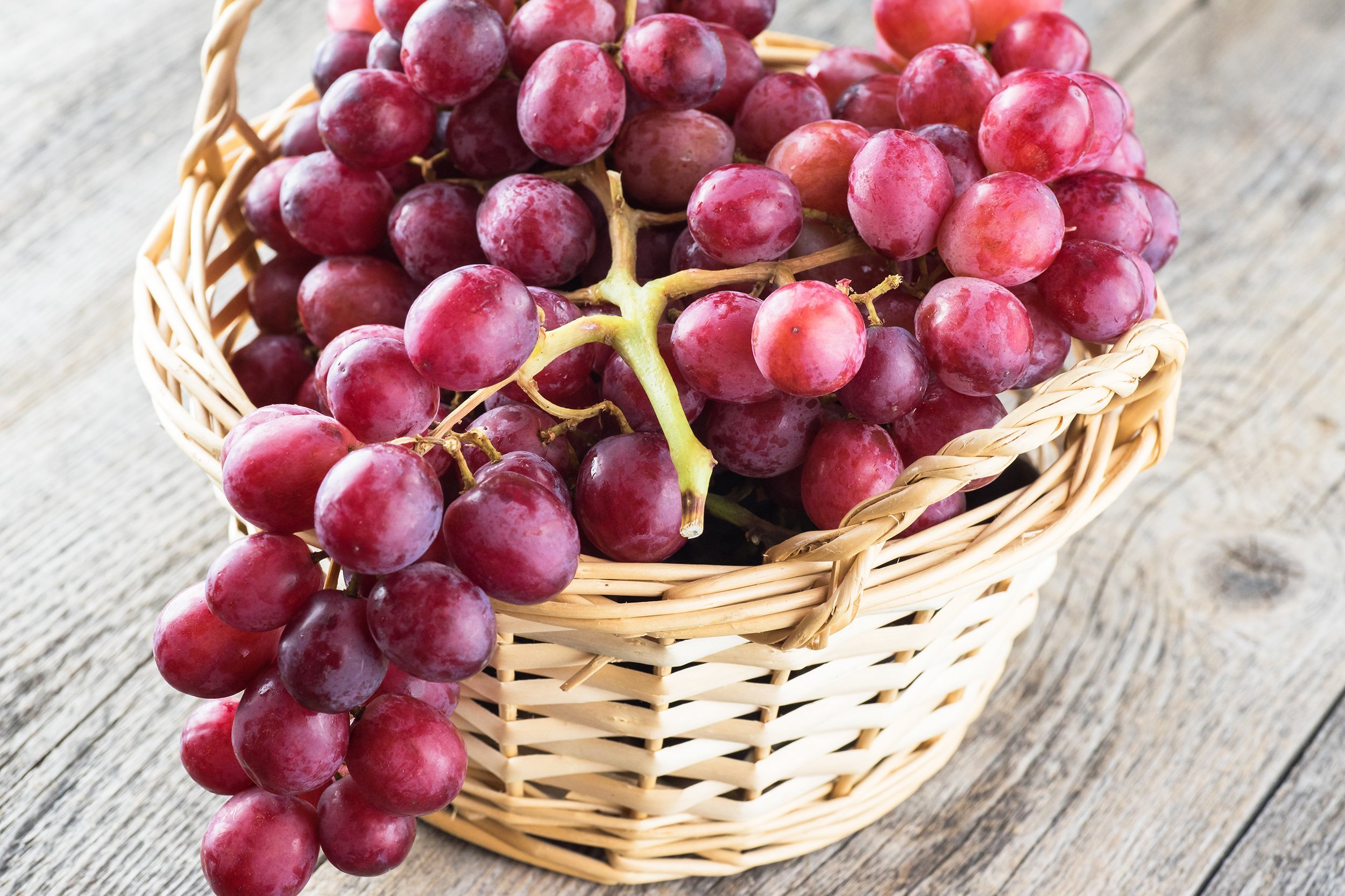 red grapes in a basket