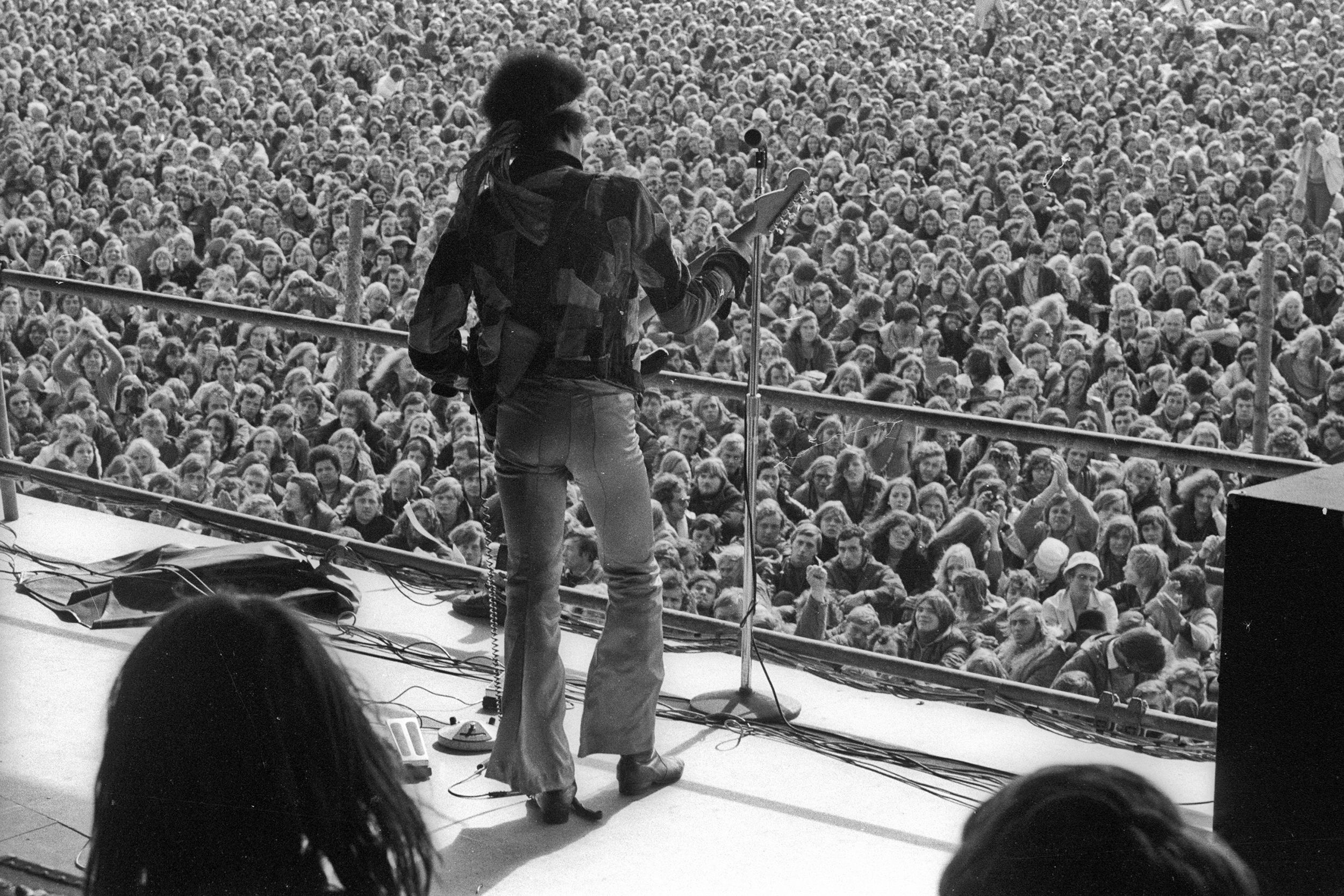 Jimi Hendrix performs onstage with his Fender Stratocaster electric guitar at his last concert on September 6, 1970 in Isle of Fehmarn, Germany