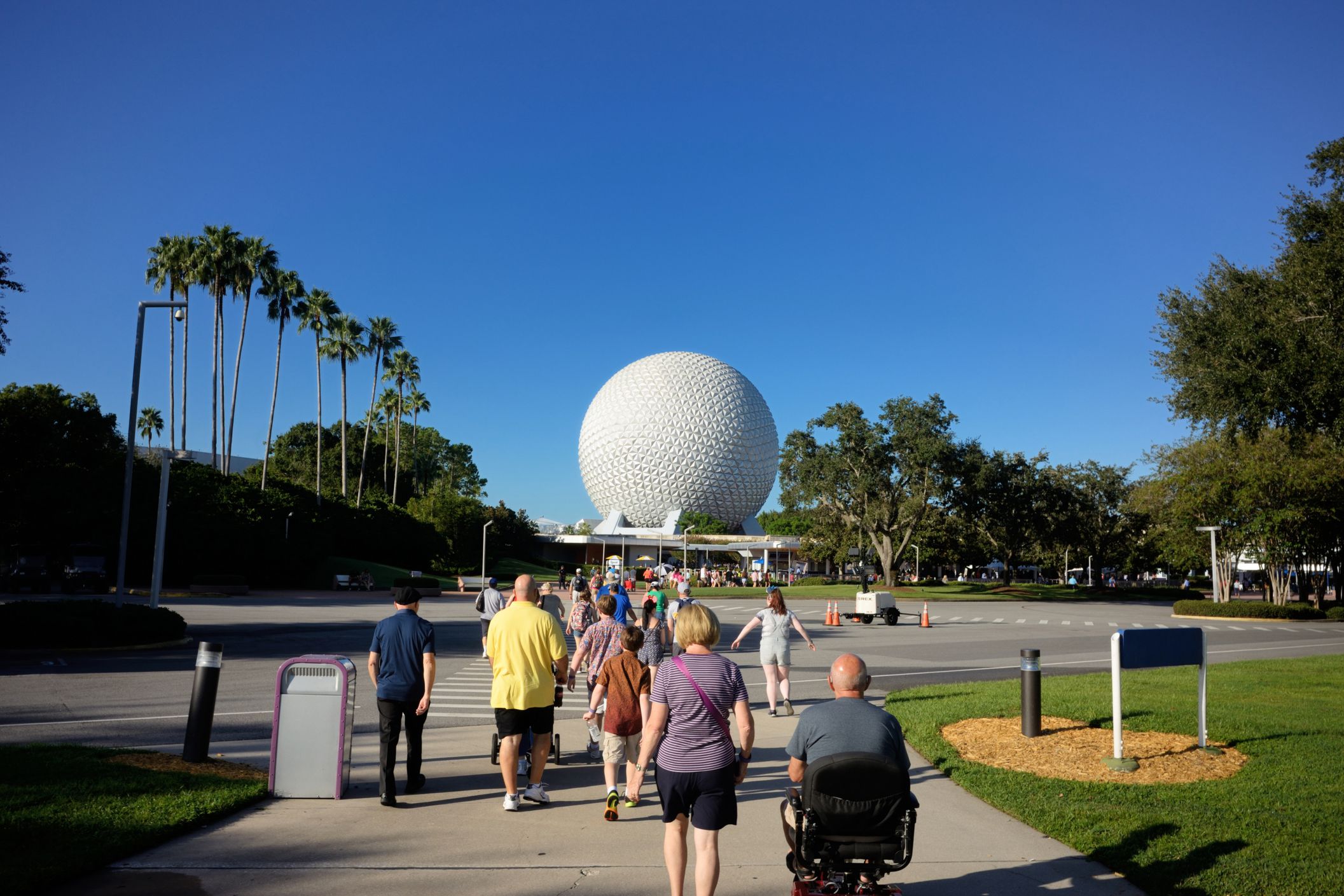 tourists walking towards epcot