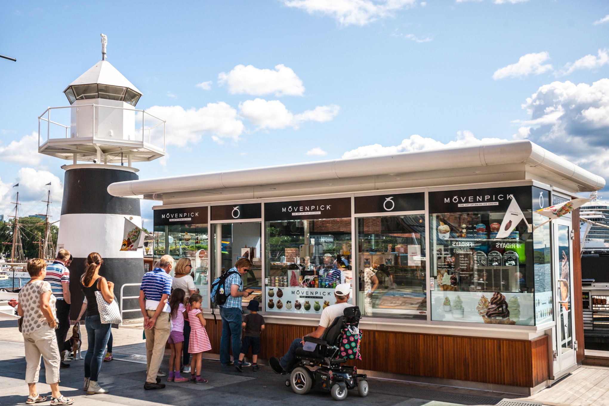 people waiting in line to buy ice-cream in oslo