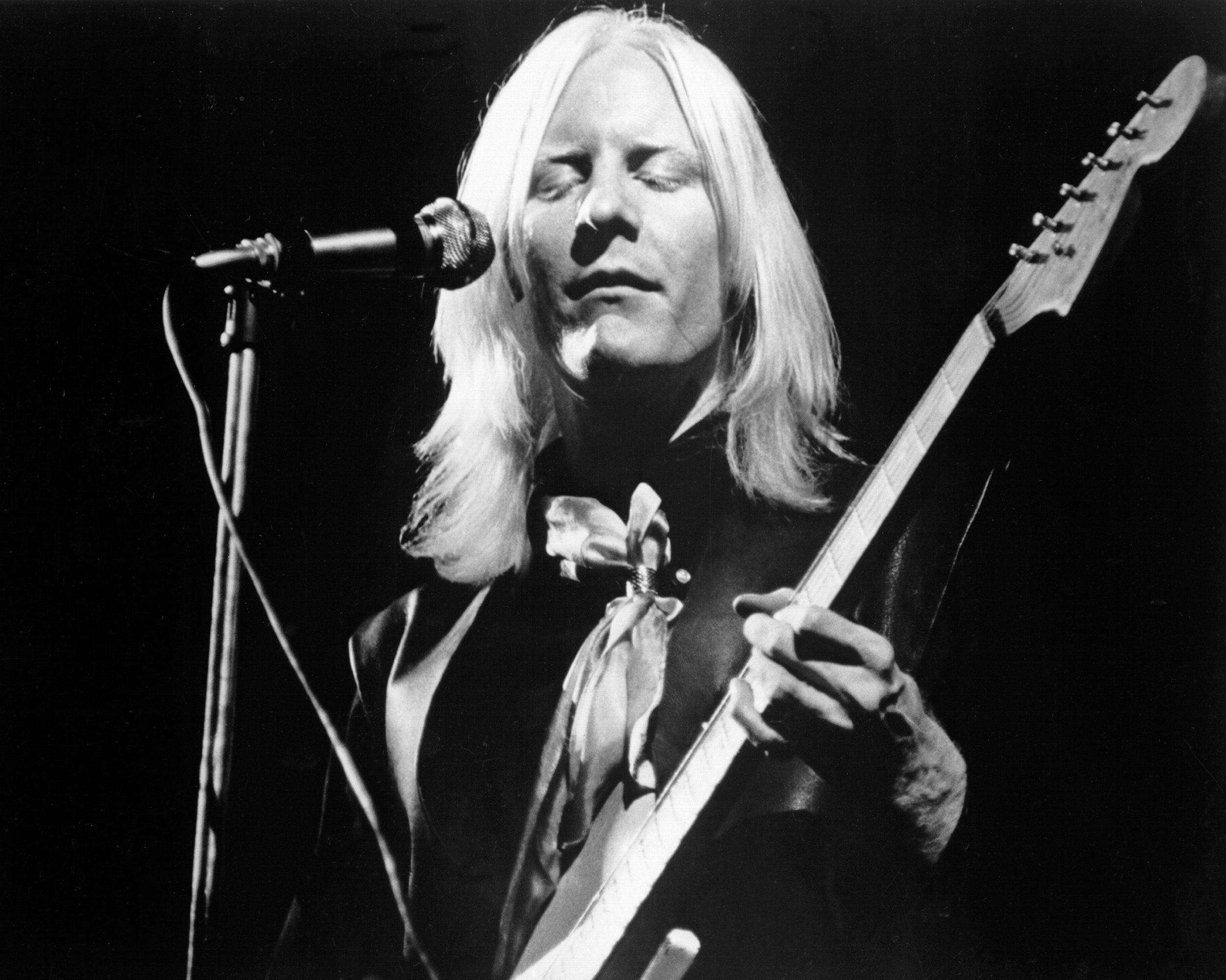 Johnny Winter performs on stage during a 1969 concert