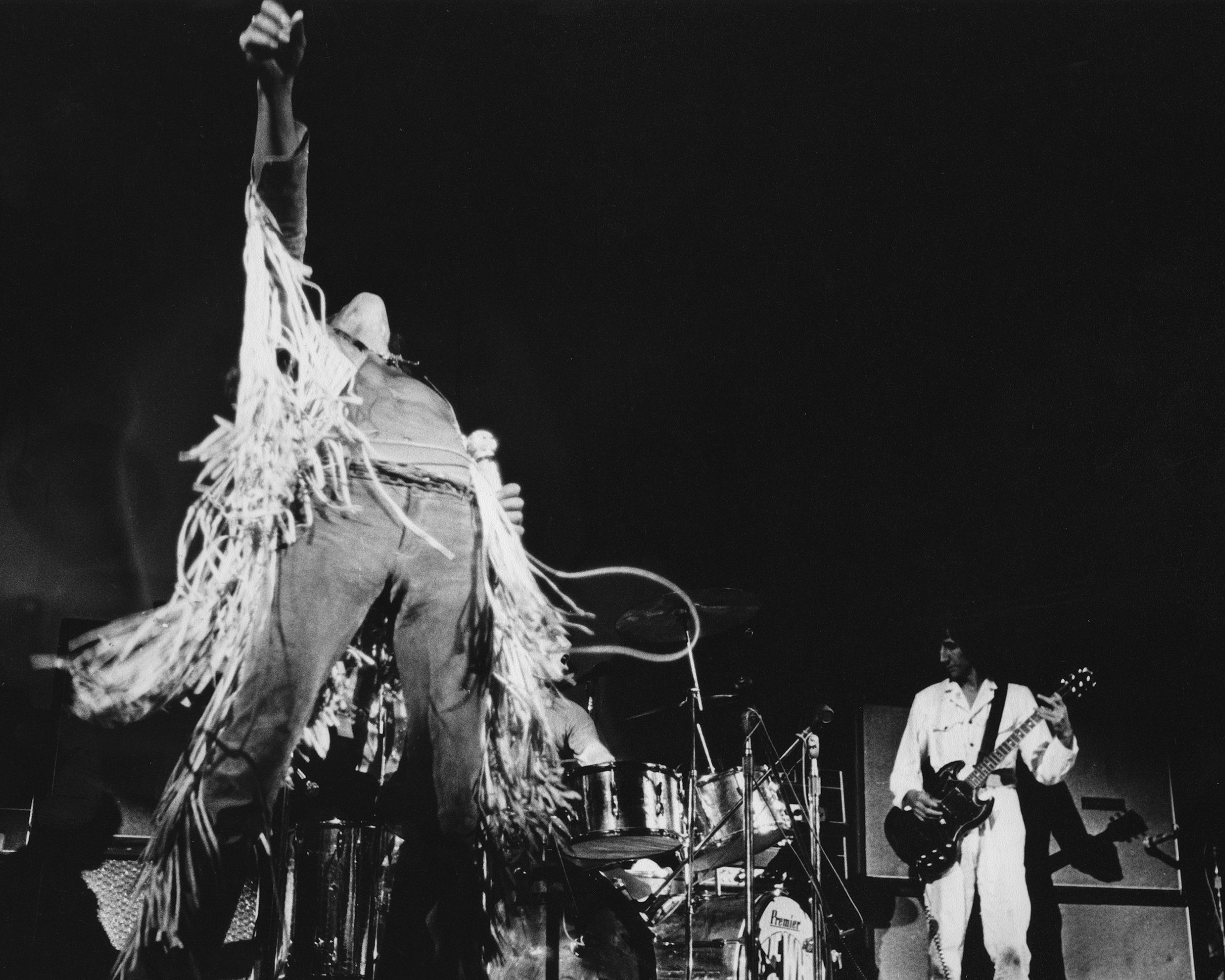 Singer Roger Daltrey and guitarist Pete Townshend of British rock band The Who on stage during a live concert performance at the Woodstock Festival