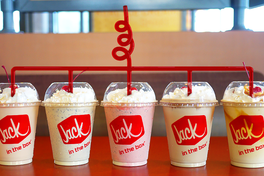 jack-in-the-box milkshakes lined up with twisting straws