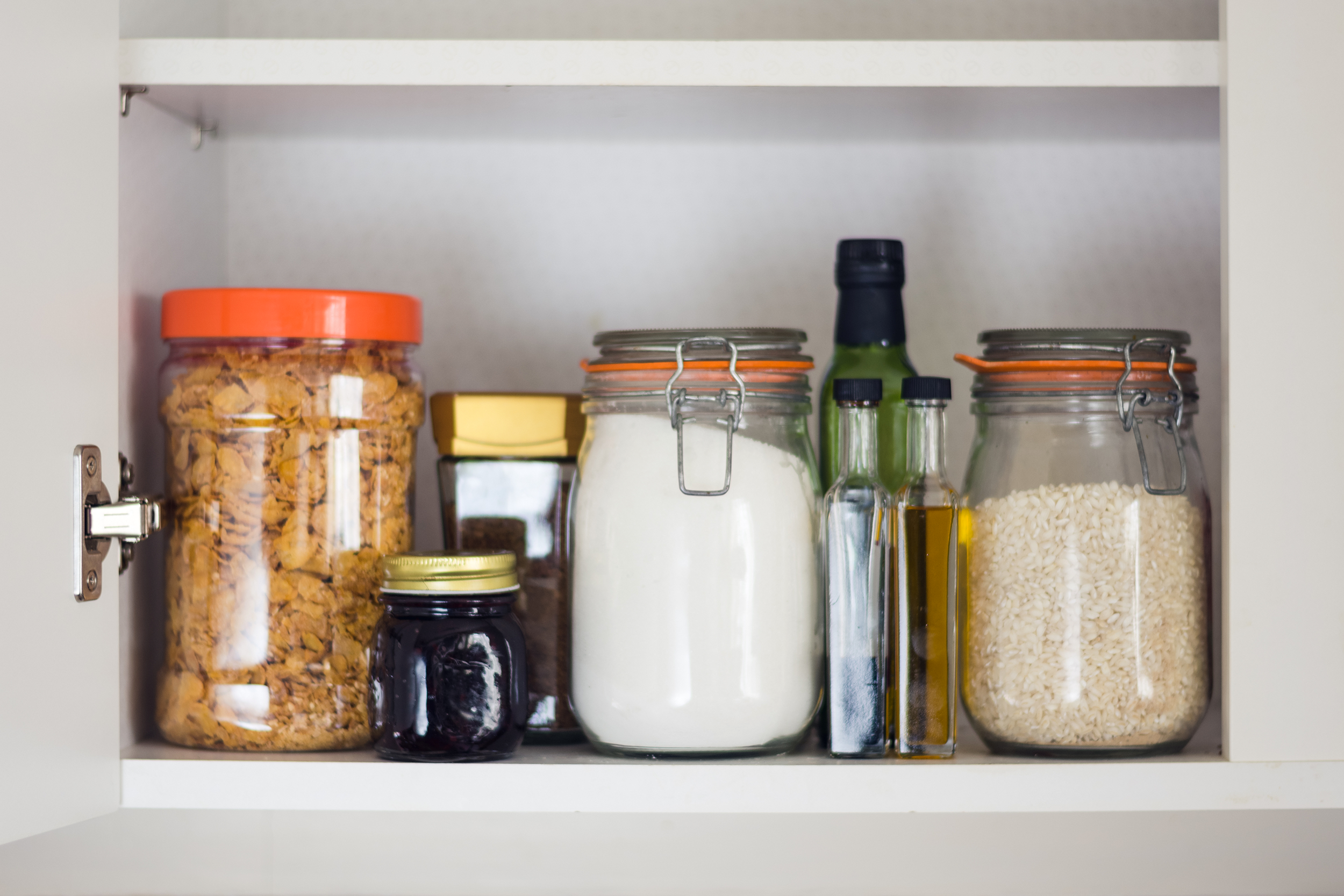 Pantry with food staples in jars