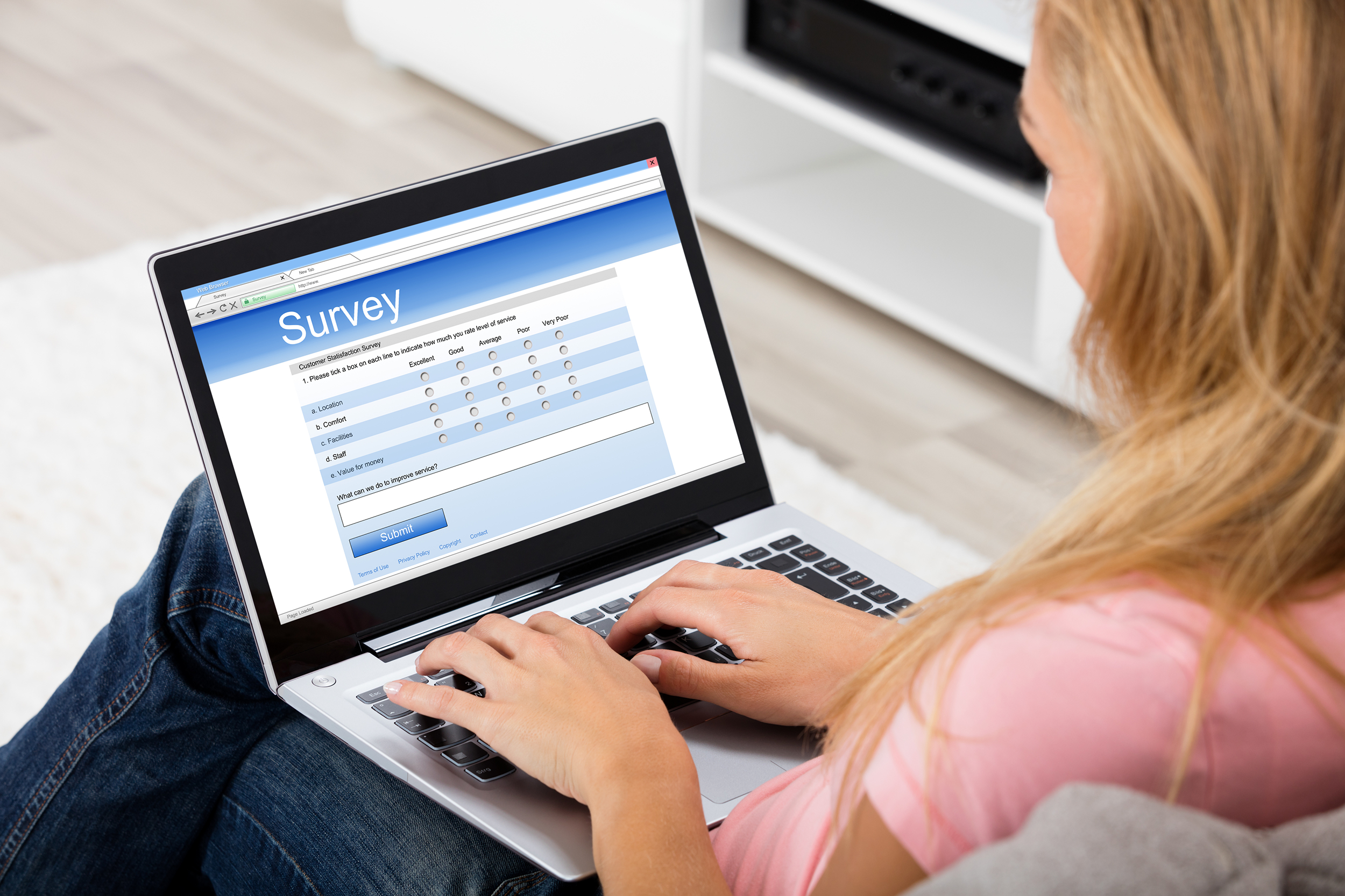 Woman taking an online survey