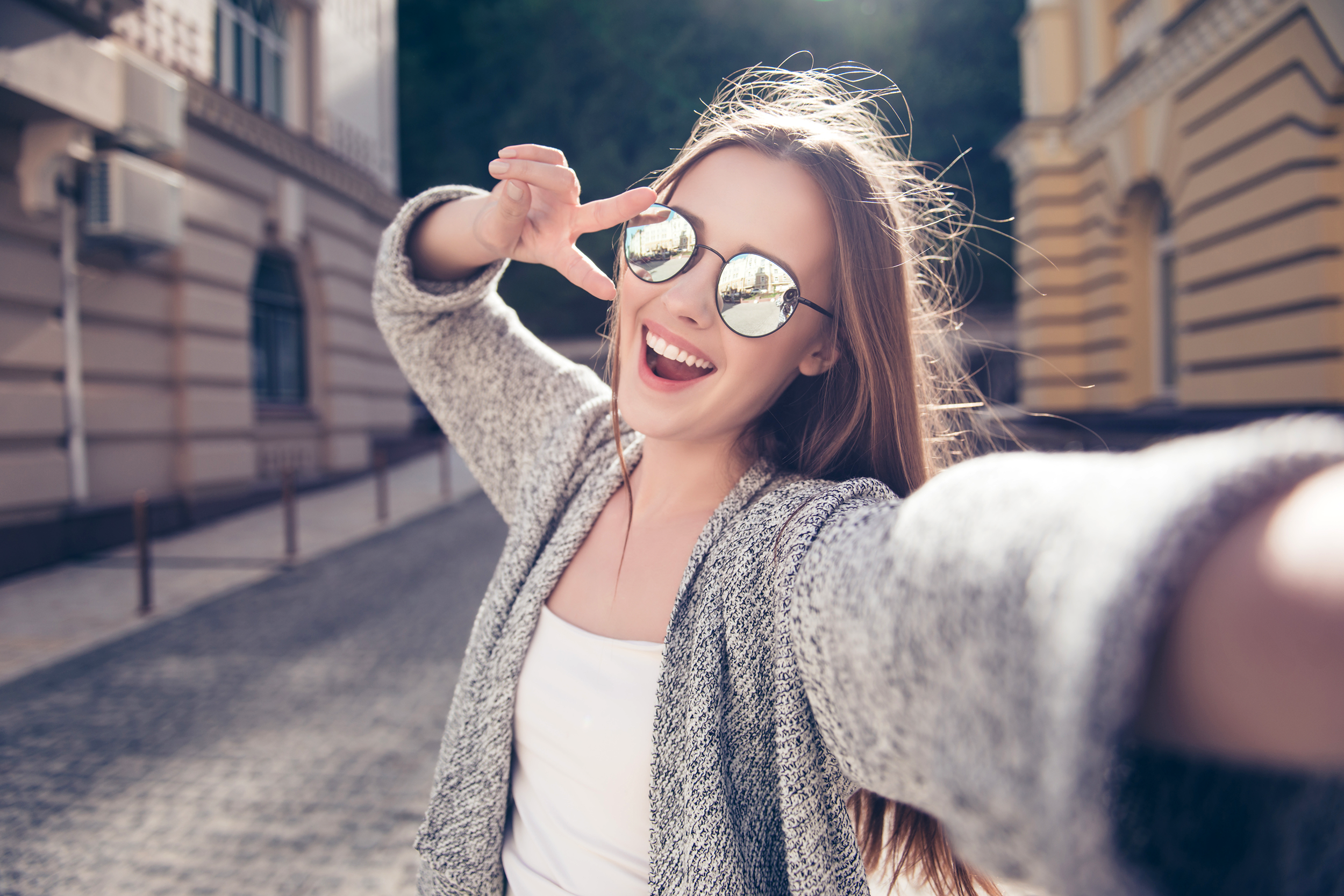 Woman taking a selfie for social media