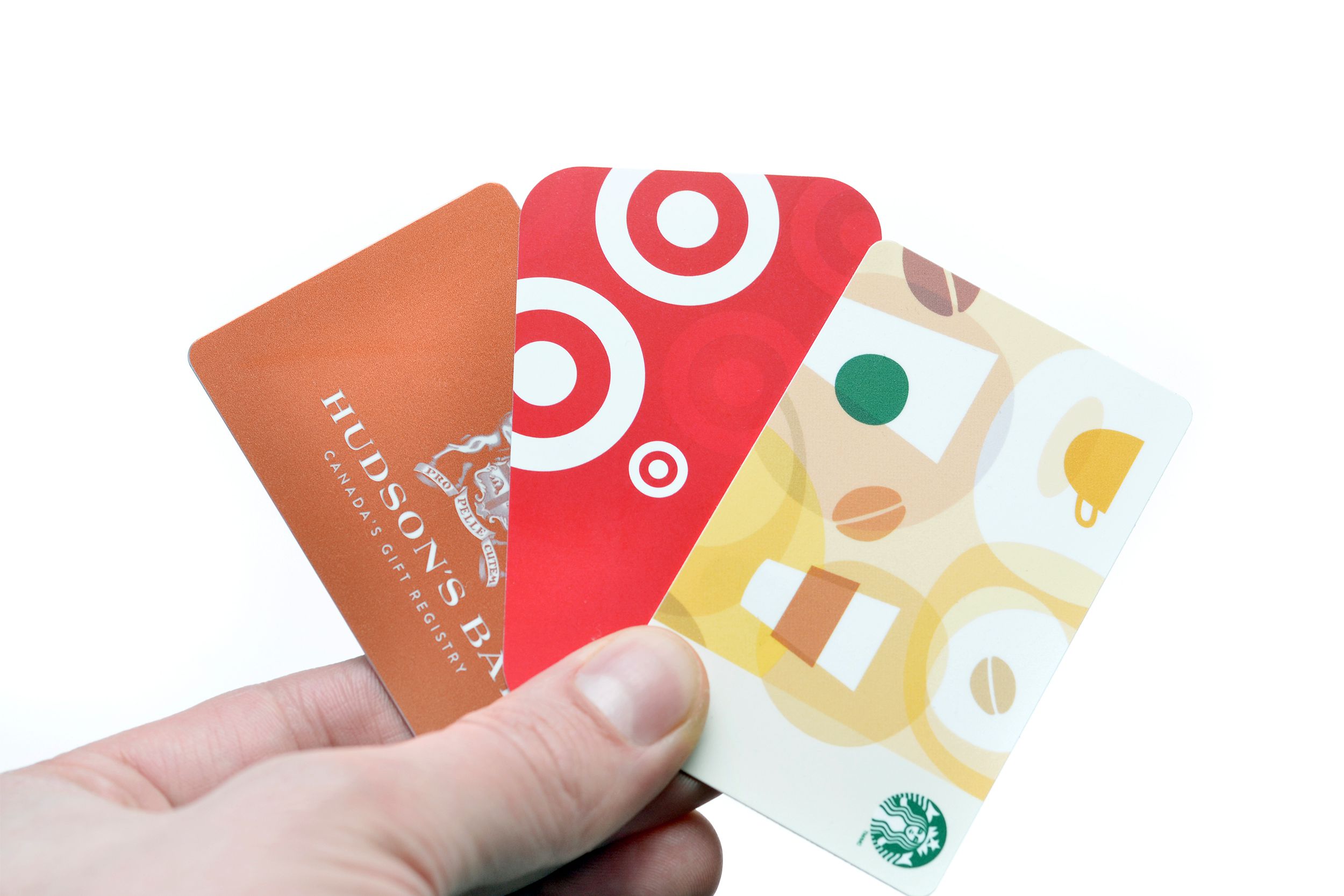 hand holding gift cards
