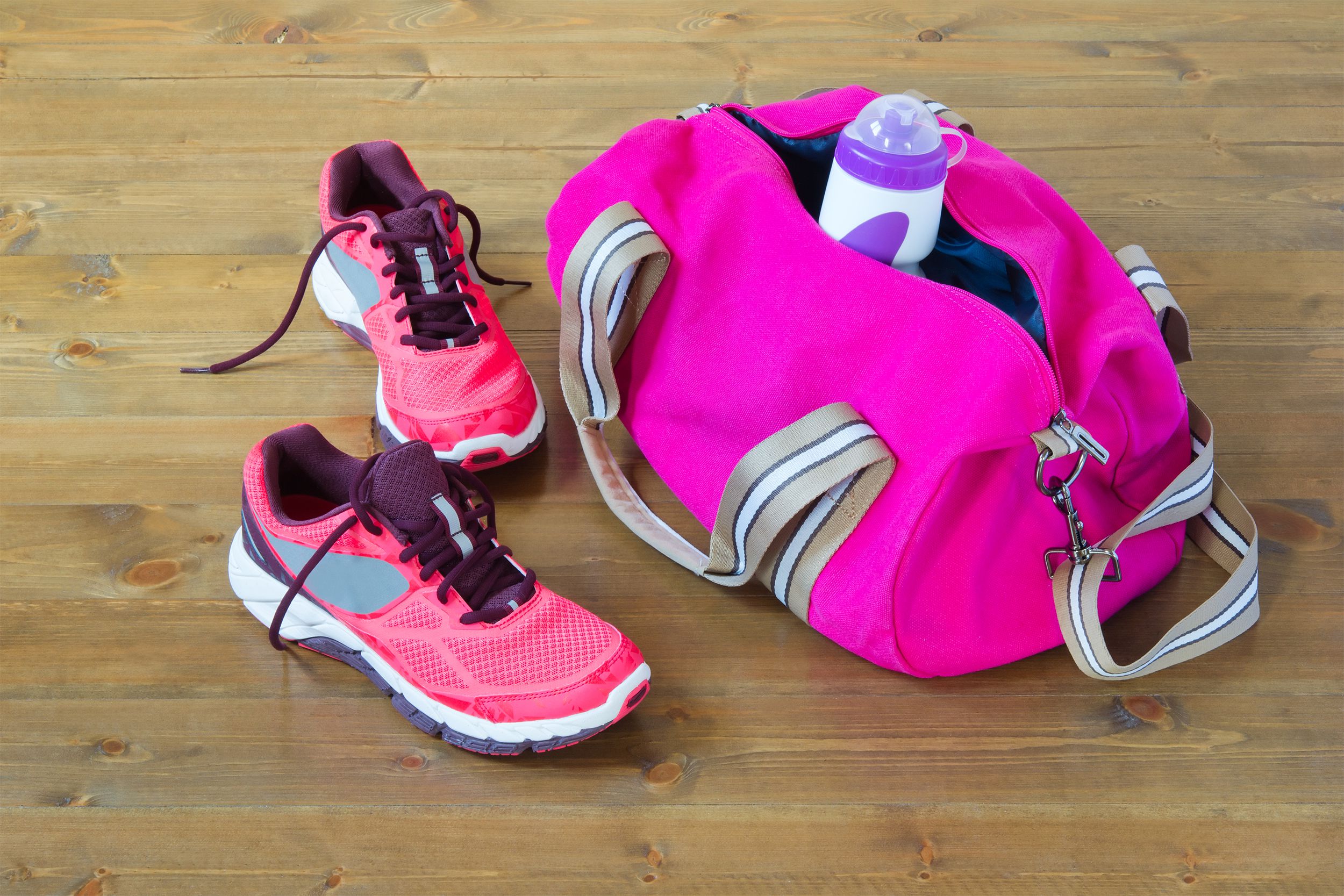 Gym bag with athletic shoes on the floor