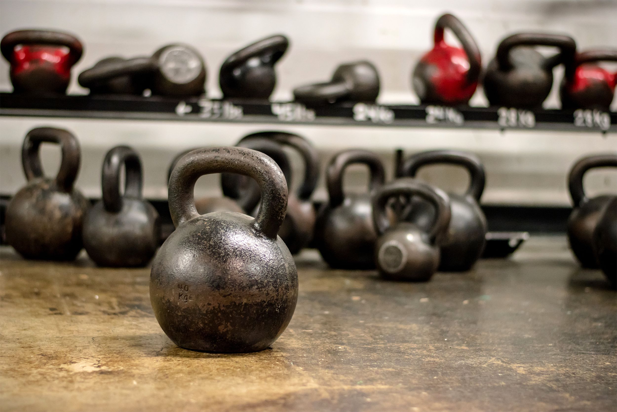 Kettlebells at the gym on the floor