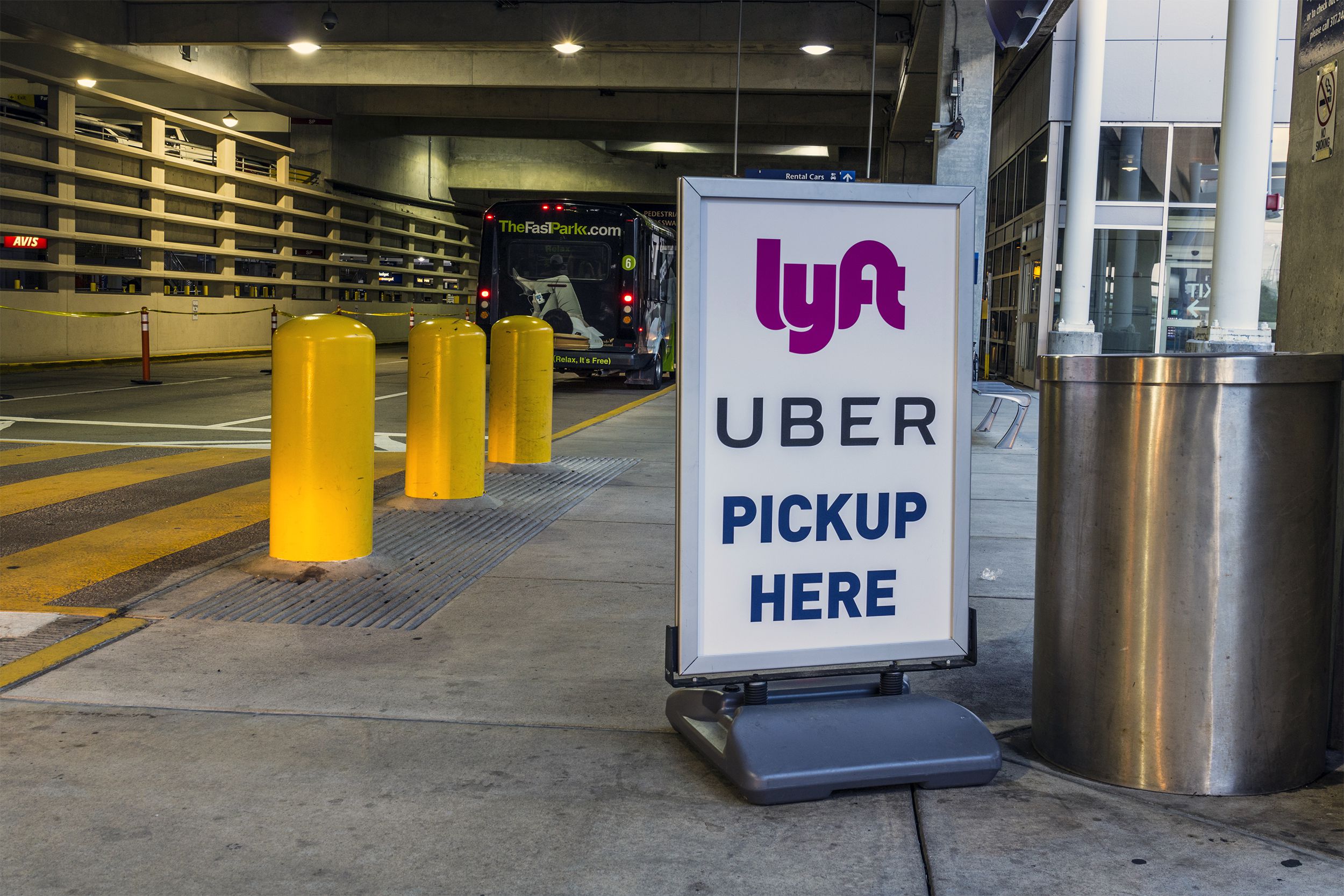 Ride sharing companies Lyft and Uber pickup spot at the airport